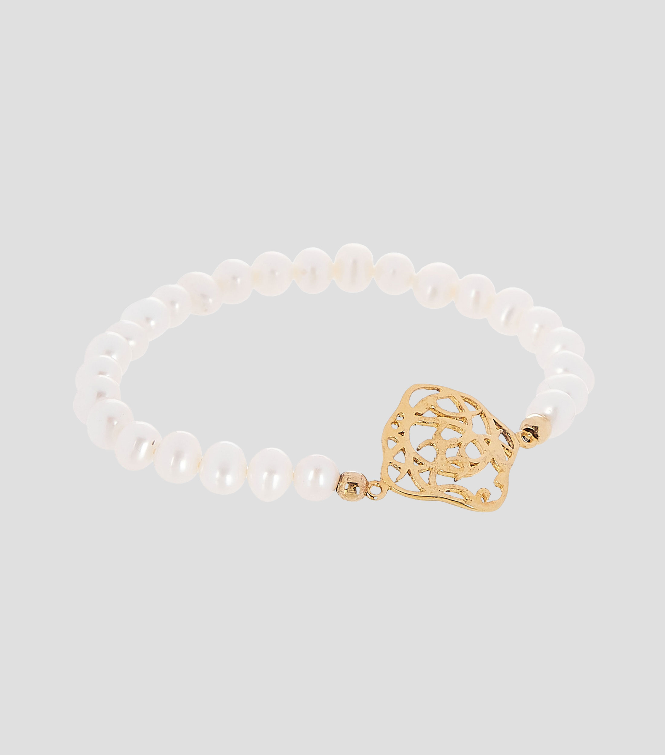Pulsera elastica con perlas Mujer
