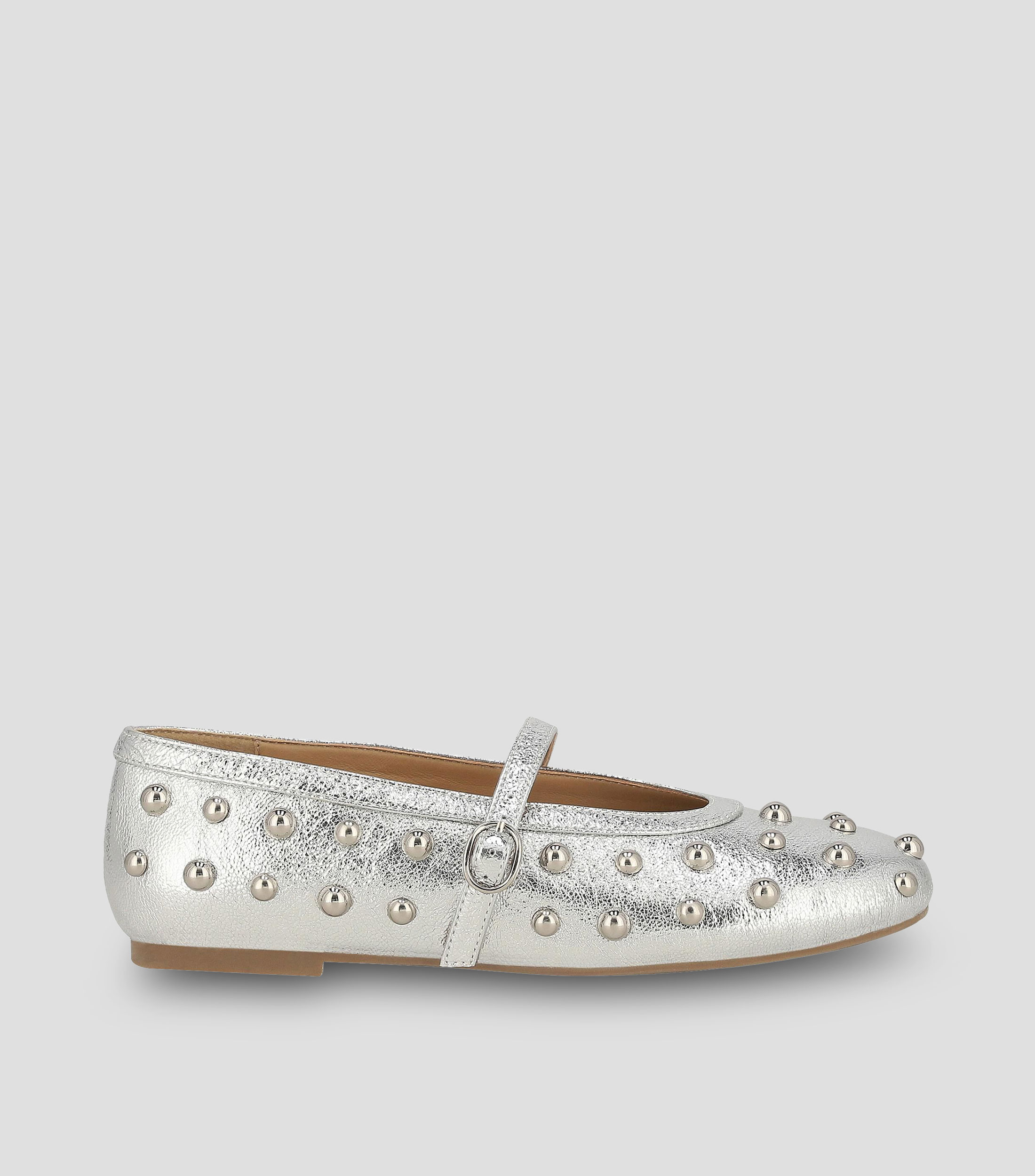 Flats en piel con tacón media luna y estoperol Mujer