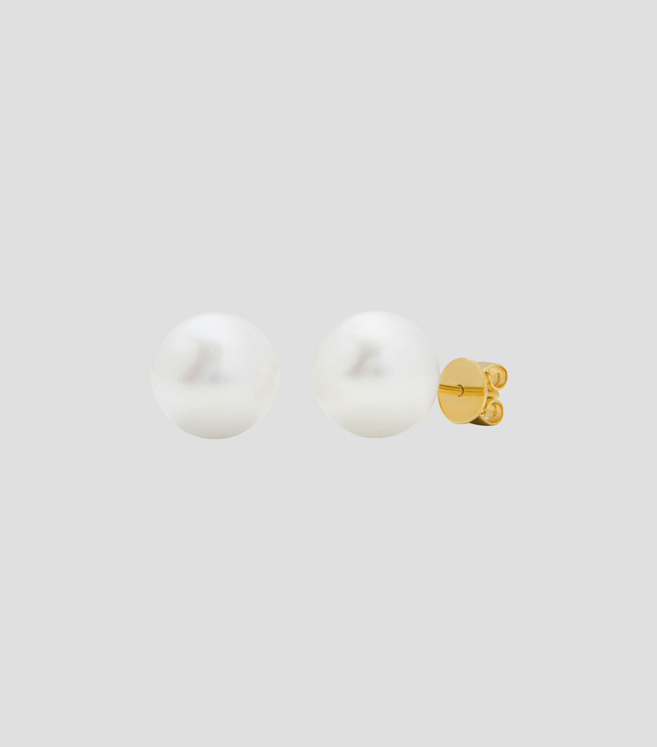 Aretes en oro amarillo de 18 kilates con perlas Mujer