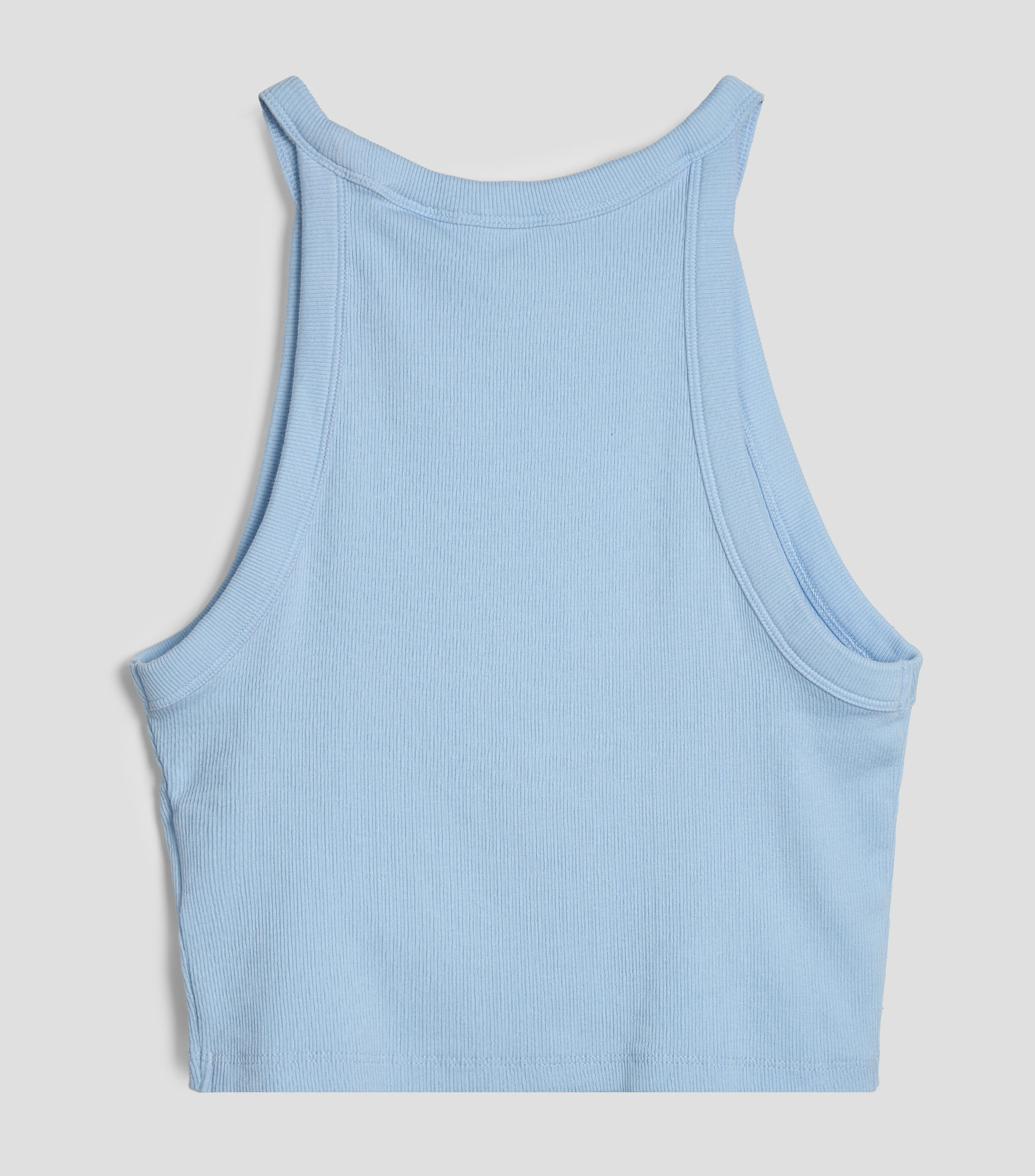 Playera cuello redondo sin mangas lisa Niña
