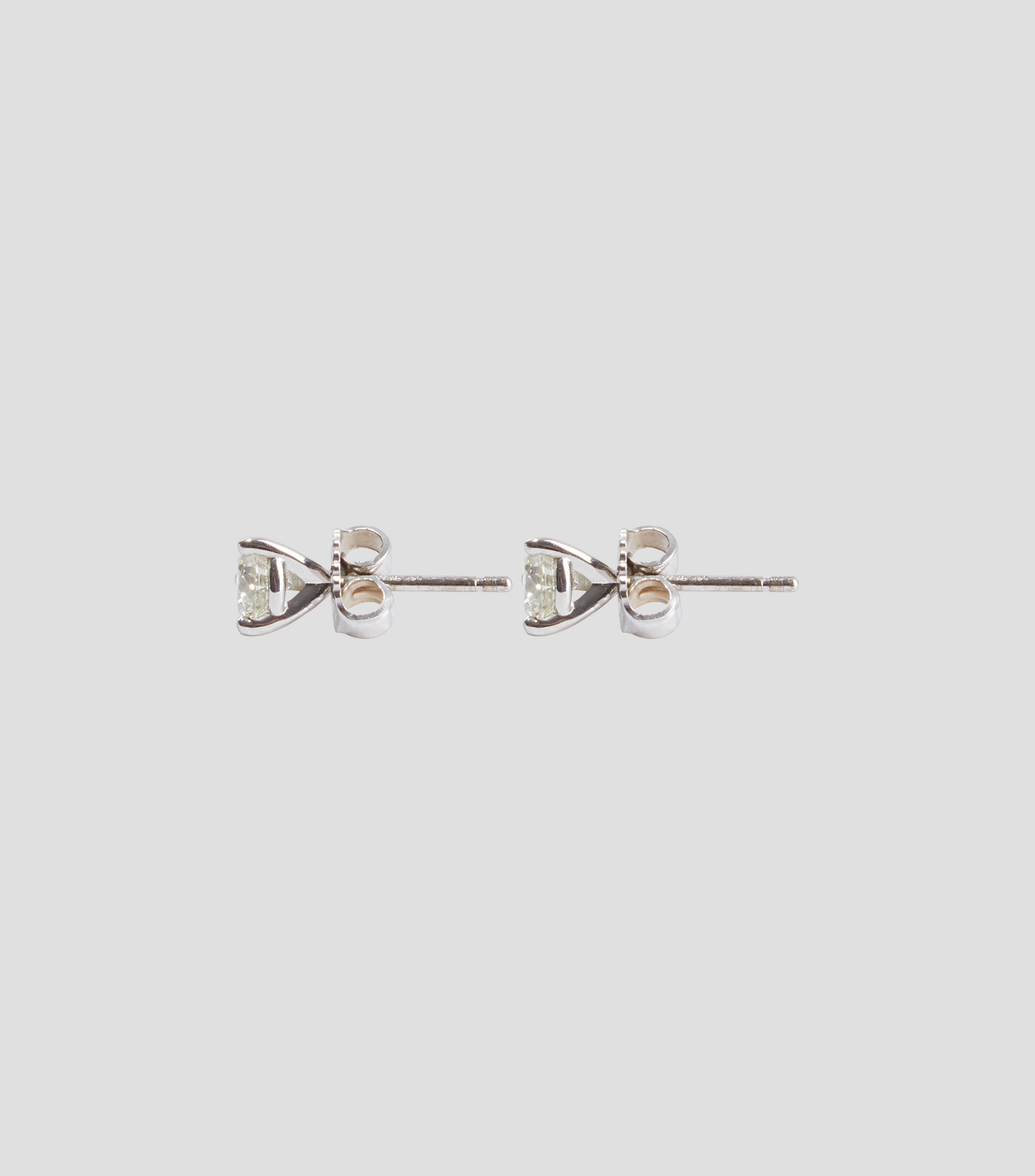 Aretes en oro blanco 14 Kts con brillante Mujer