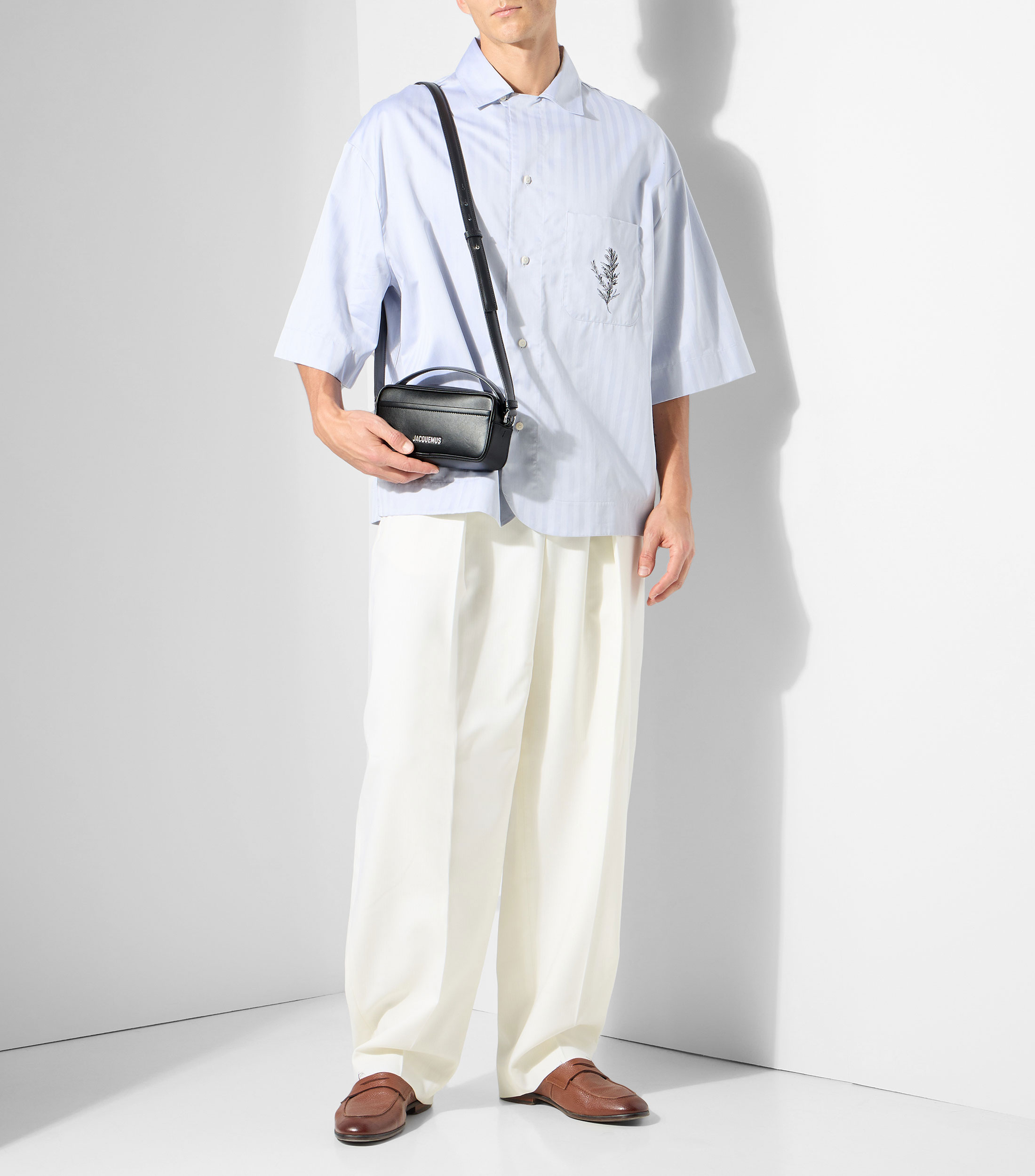 Bolso crossbody en piel liso Hombre