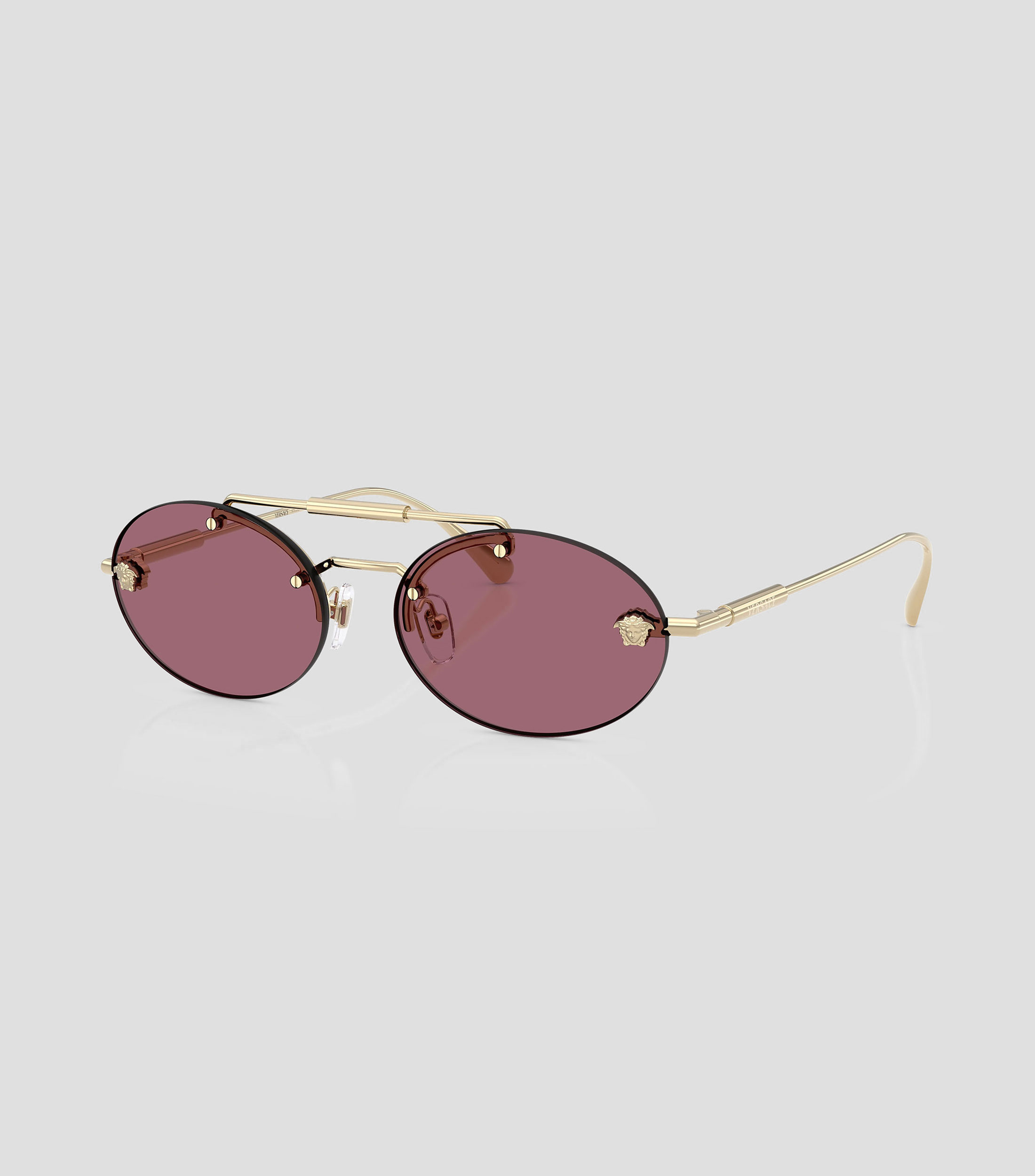 Lentes de sol ovalados dorados Hombre
