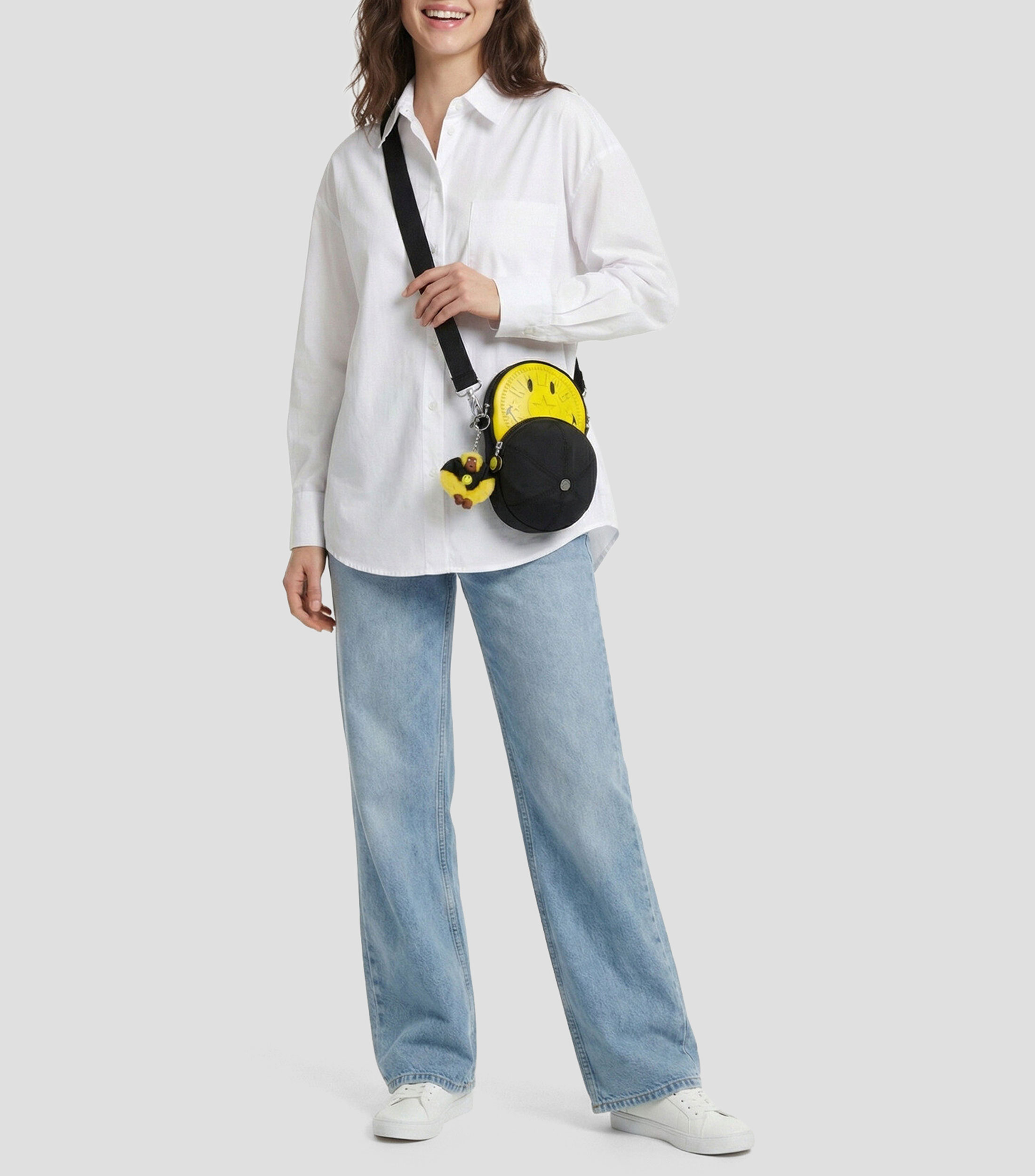 Bolsa crossbody negro y amarillo estampada Niña