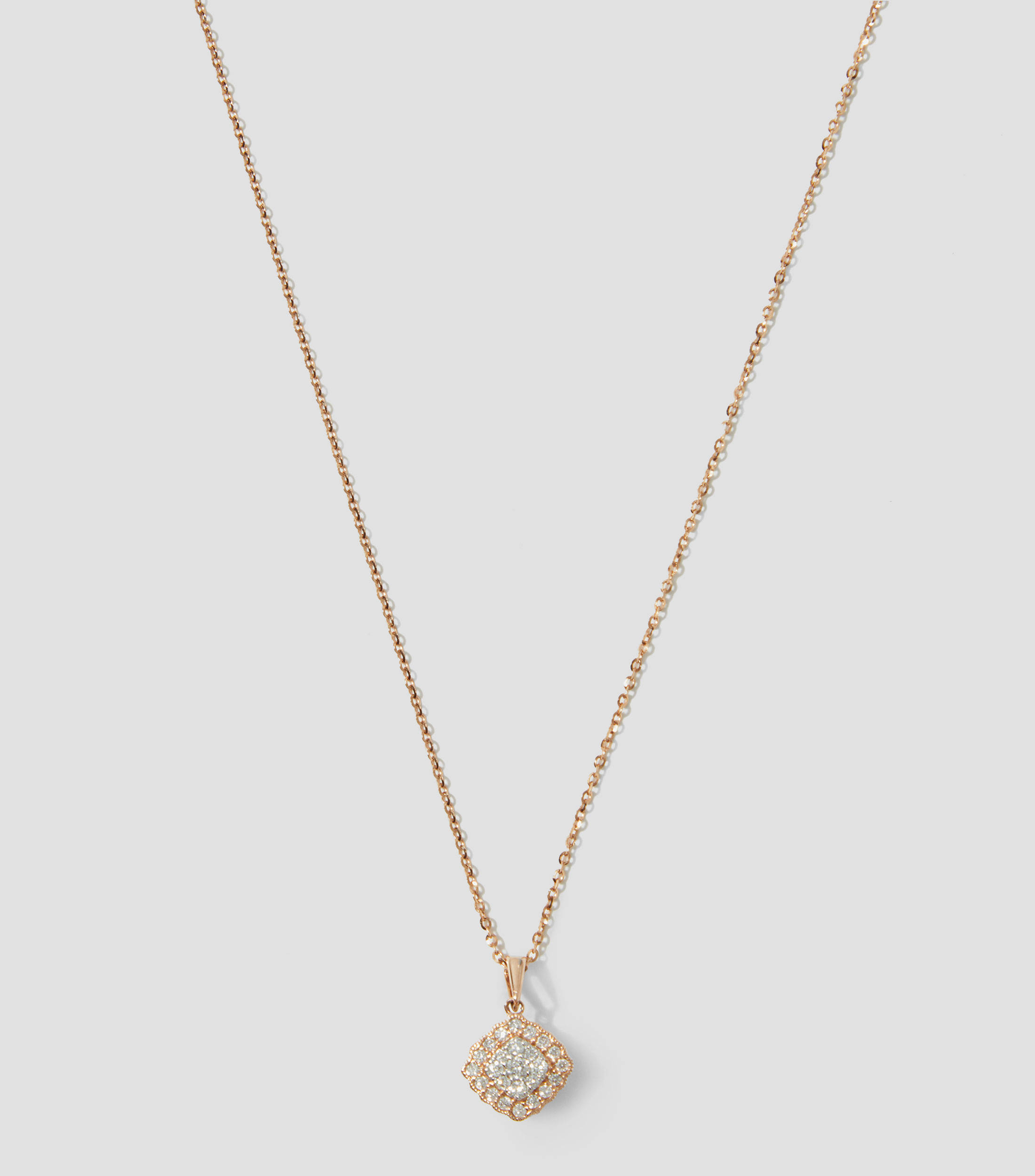 Dije con cadena en oro de 14 kilates Mujer