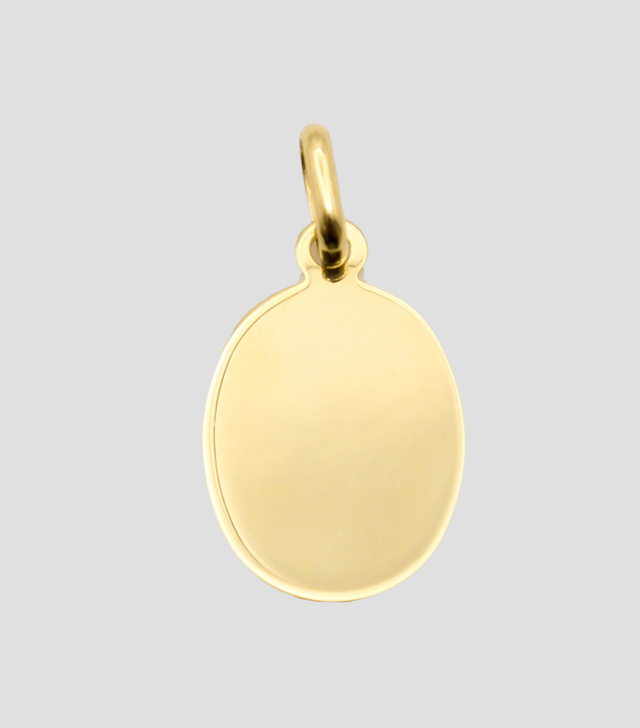 Medalla en oro amarillo 14 Kilates Sagrado Corazon Unisex