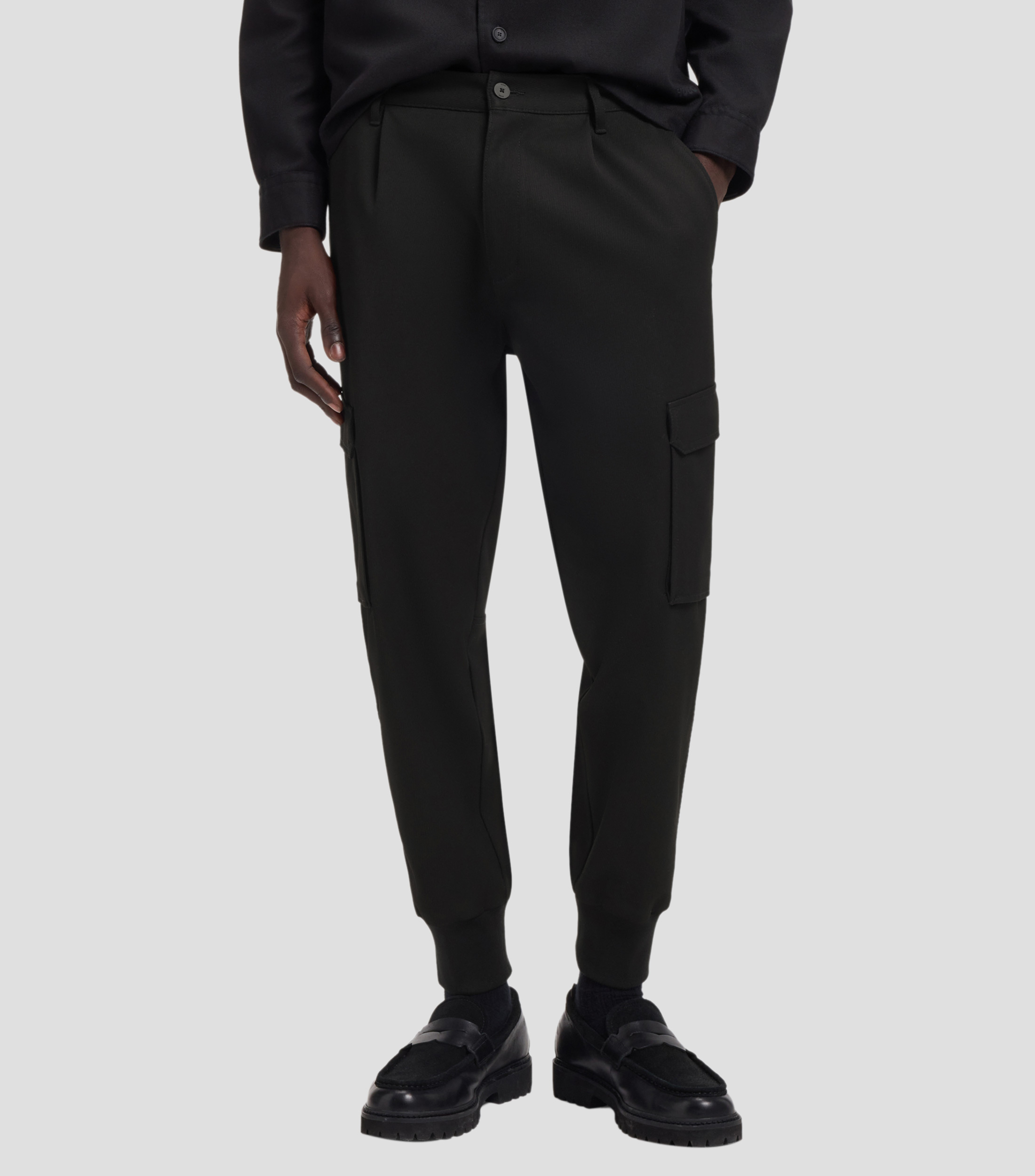 Pantalones slim fit con bolsillos estilo cargo Hombre