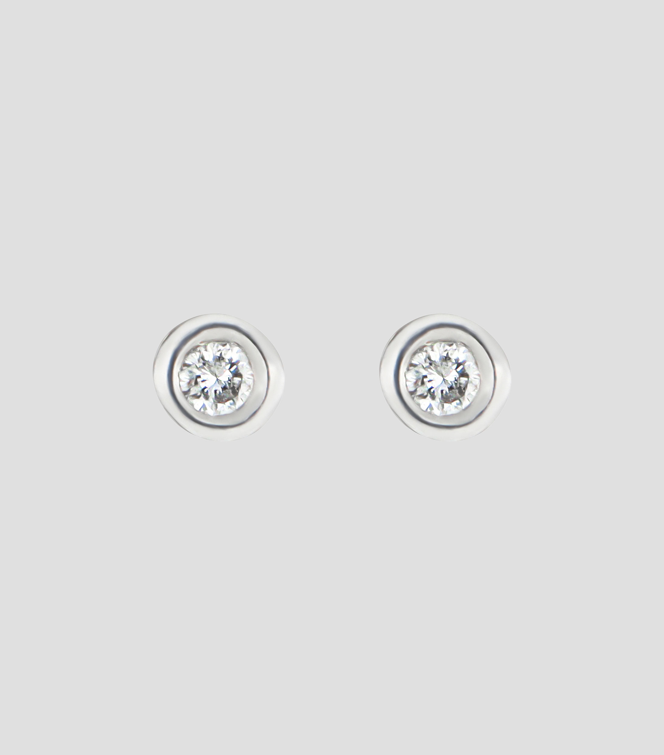 Broqueles en oro blanco de 14 kilates con diamante Mujer