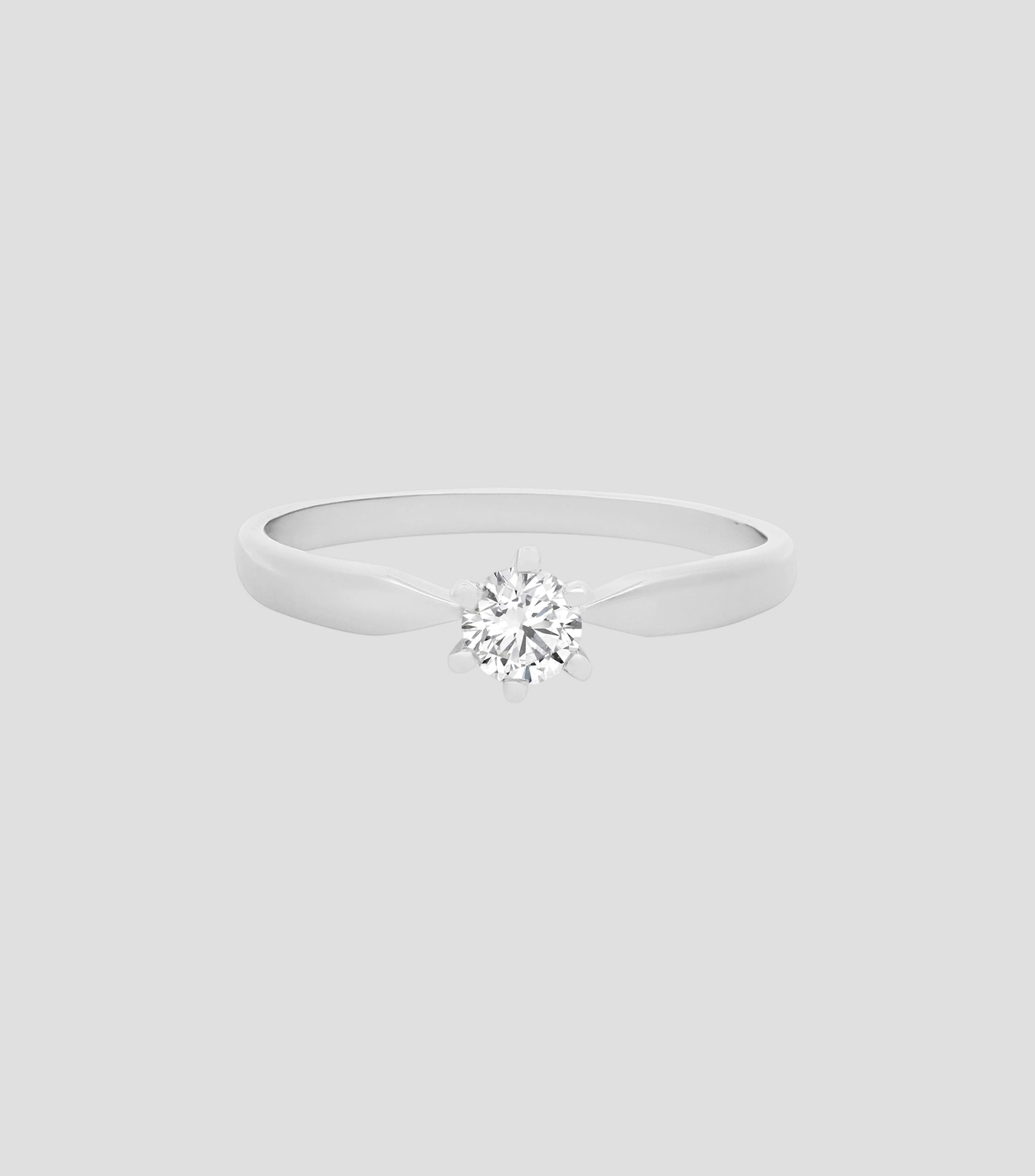 Anillo solitario en oro con pedrería Mujer