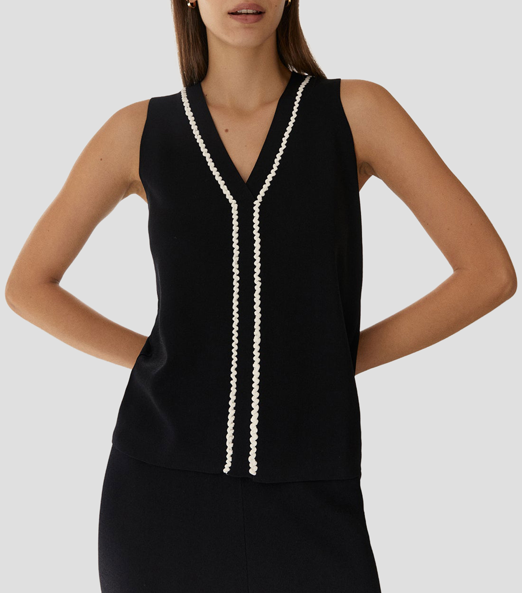 Blusa lisa sin mangas Mujer