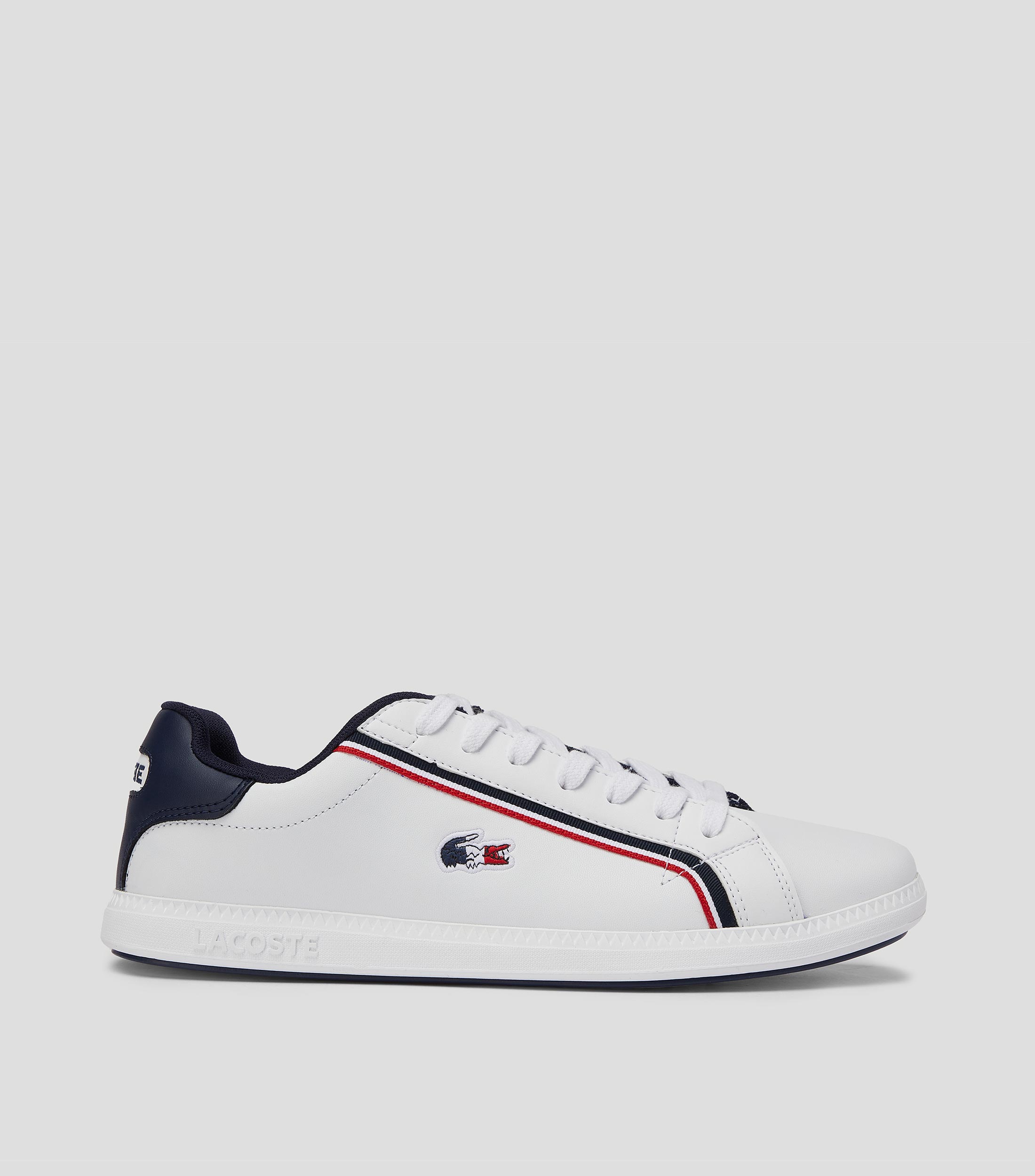 Lacoste: Tenis casuales Graduate en piel blancos Hombre