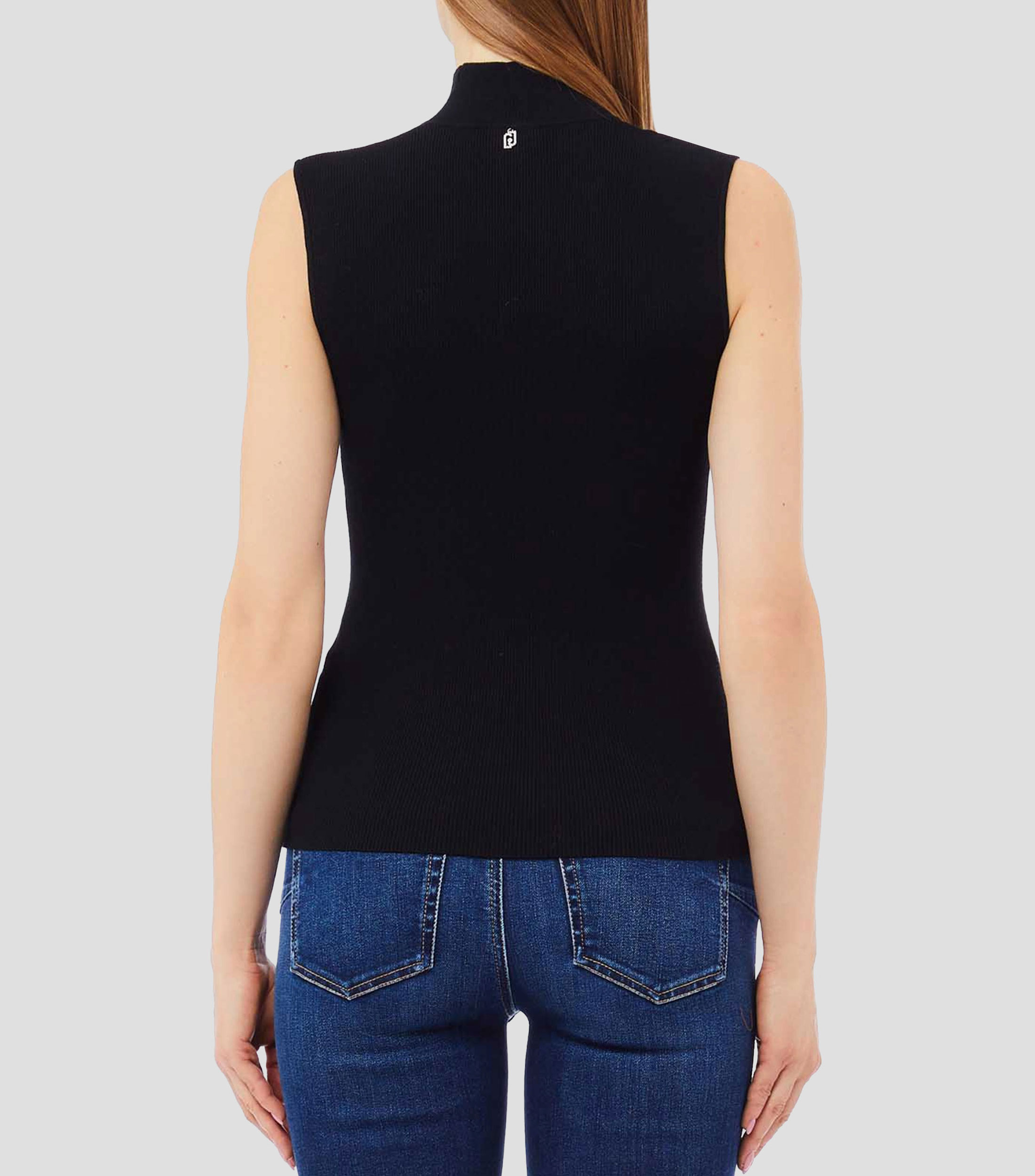 Blusa lisa sin mangas Mujer