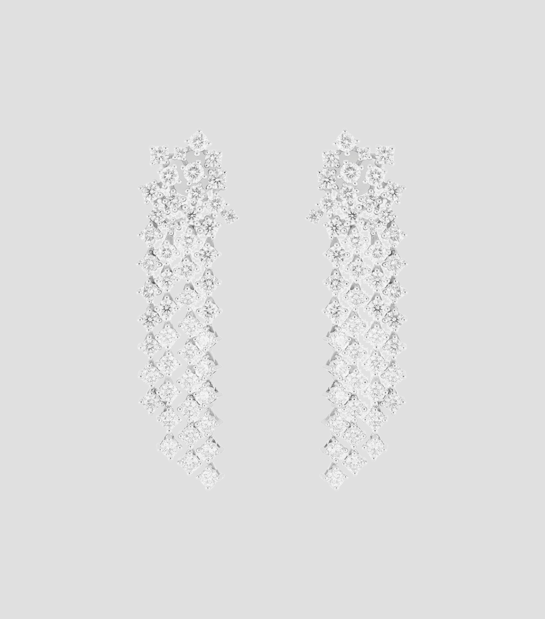 Aretes en oro blanco de 14 kilates con diamante Mujer