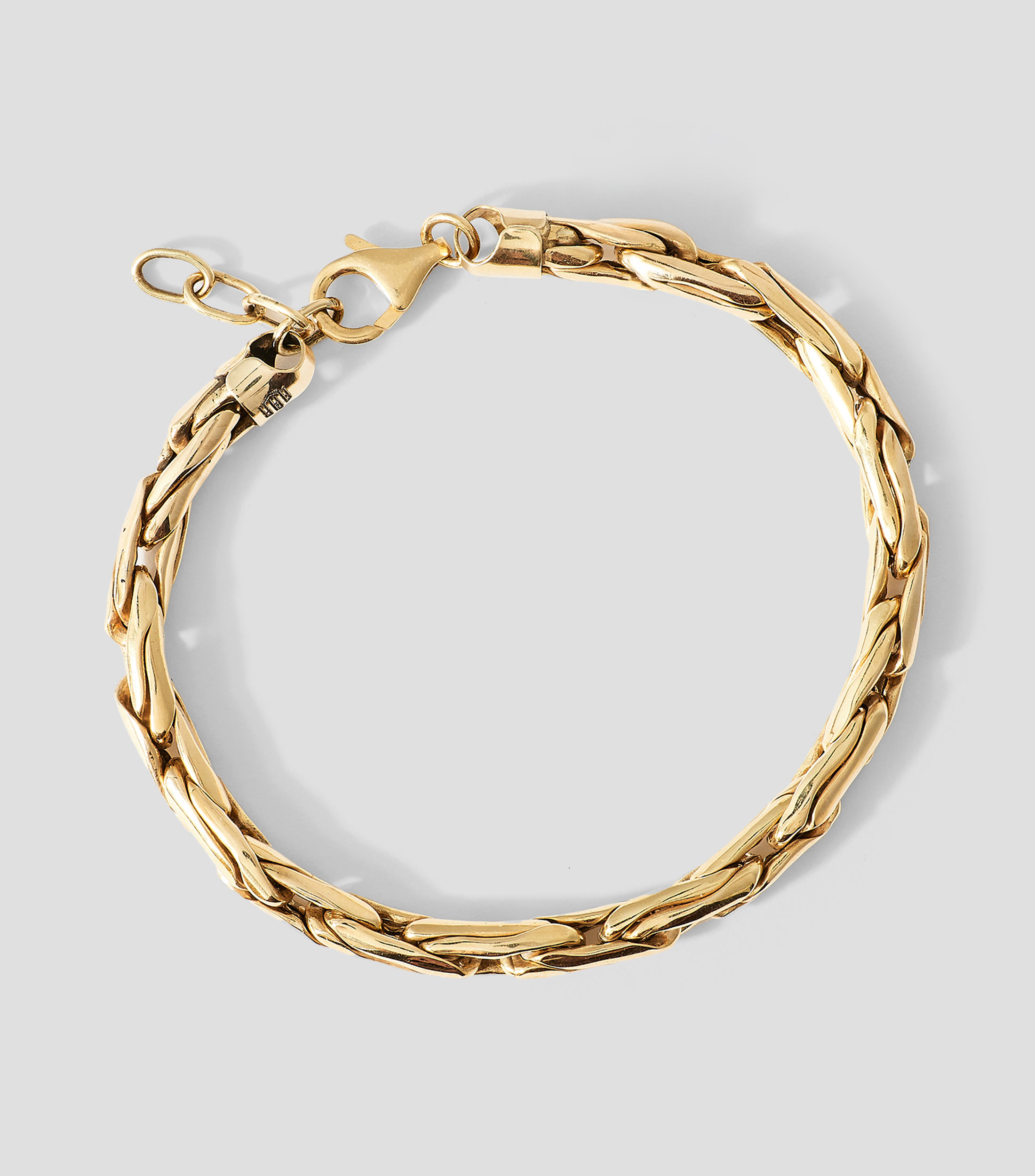 Pulsera en oro de 10 kilates con eslabones ondulados gruesos Hombre