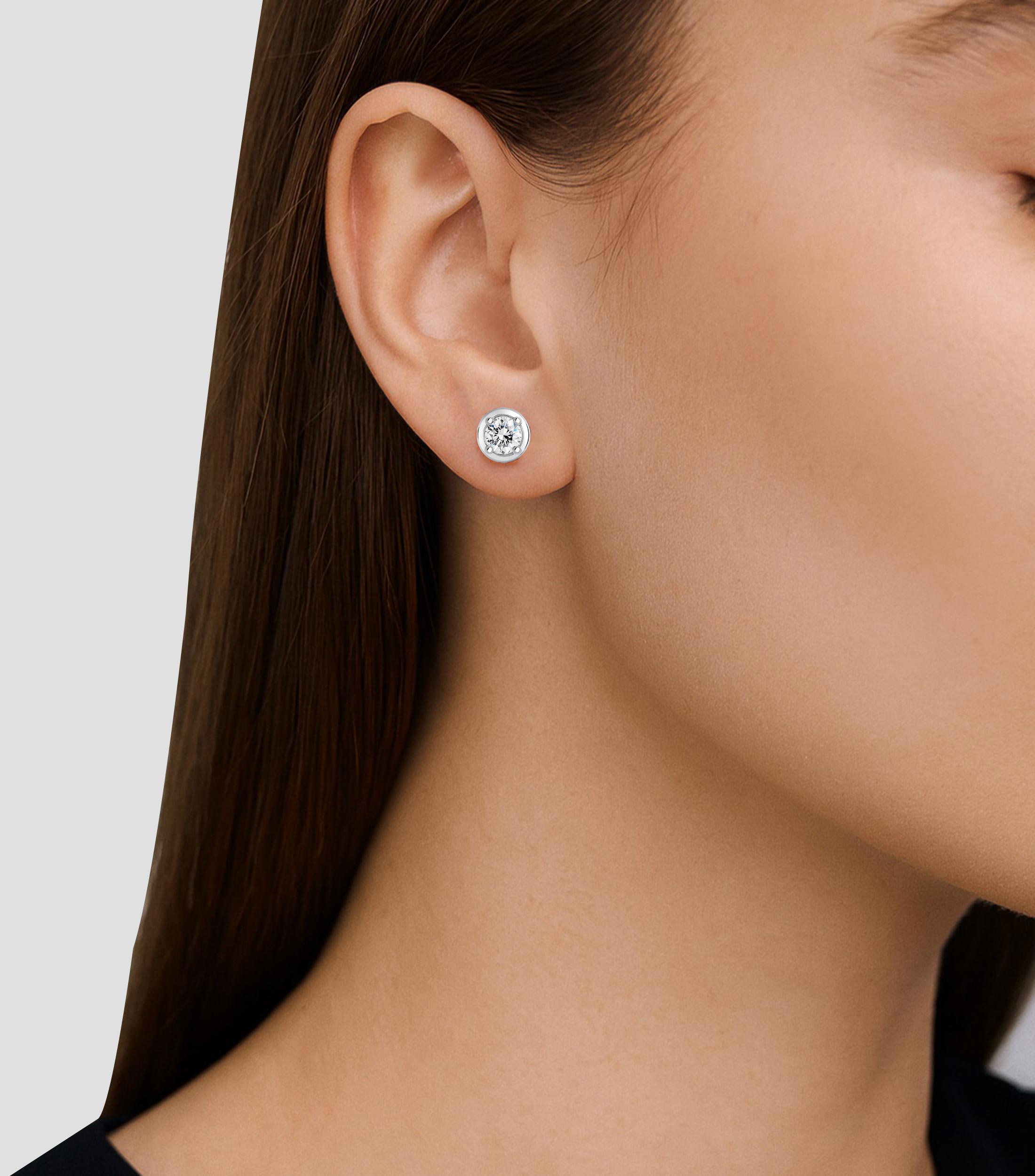 Aretes en oro de 18 Kts con diamantes Mujer