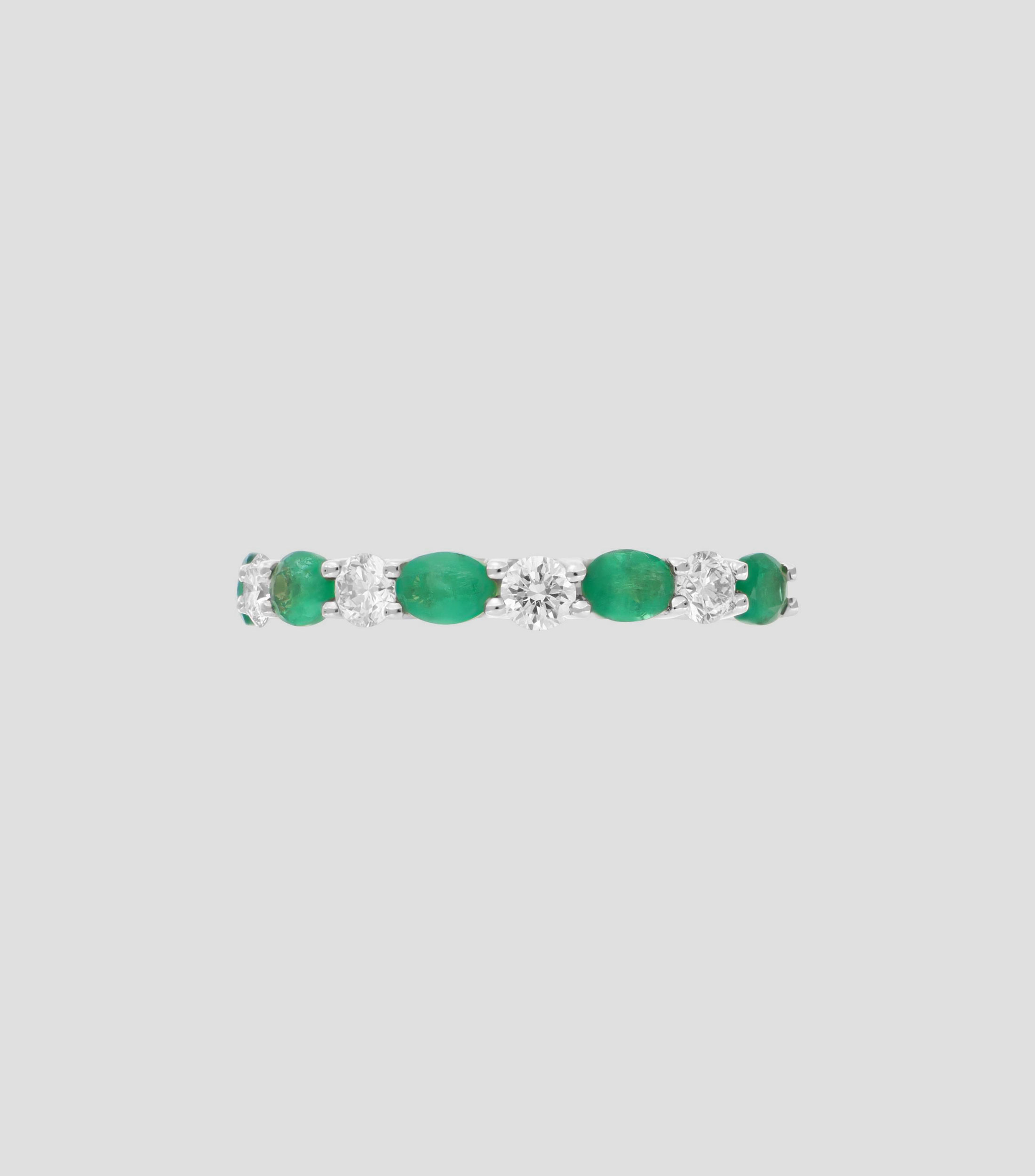 Anillo en oro blanco de 14 kilates con esmeraldas Mujer