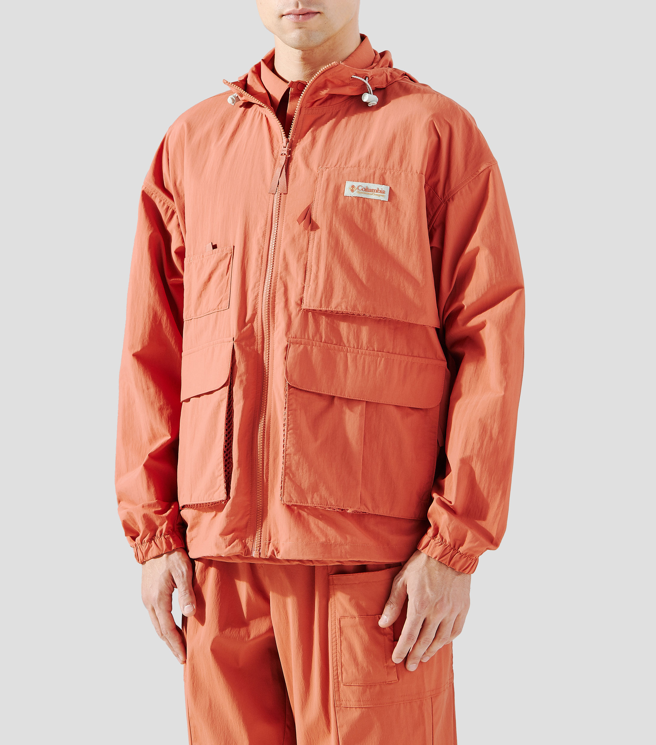 Chamarra rompevientos con capucha Hombre