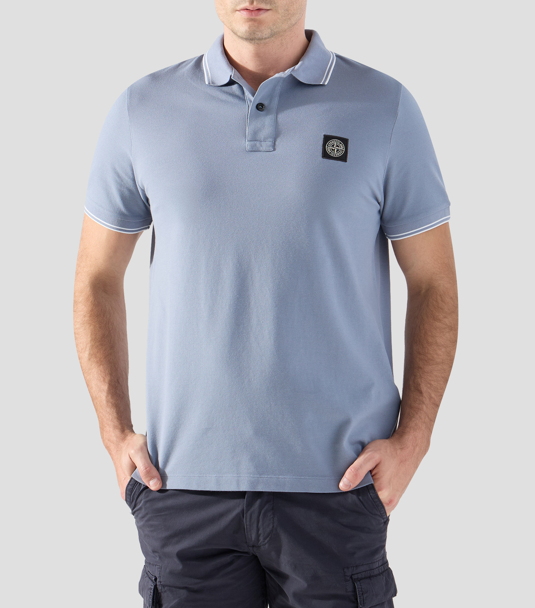 Playera tipo polo con manga corta lisa Hombre