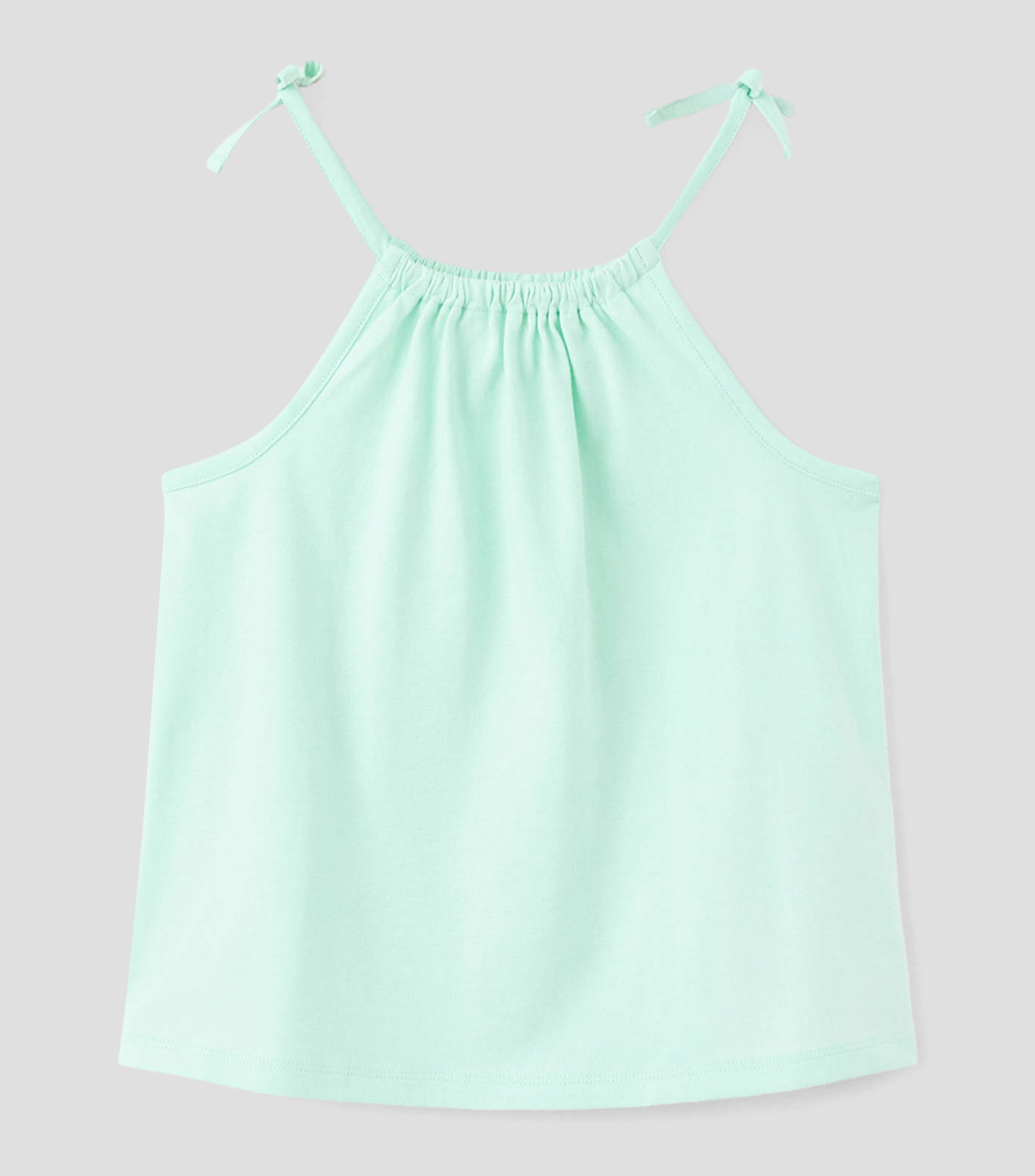 Playera cuello redondo sin mangas lisa Niña