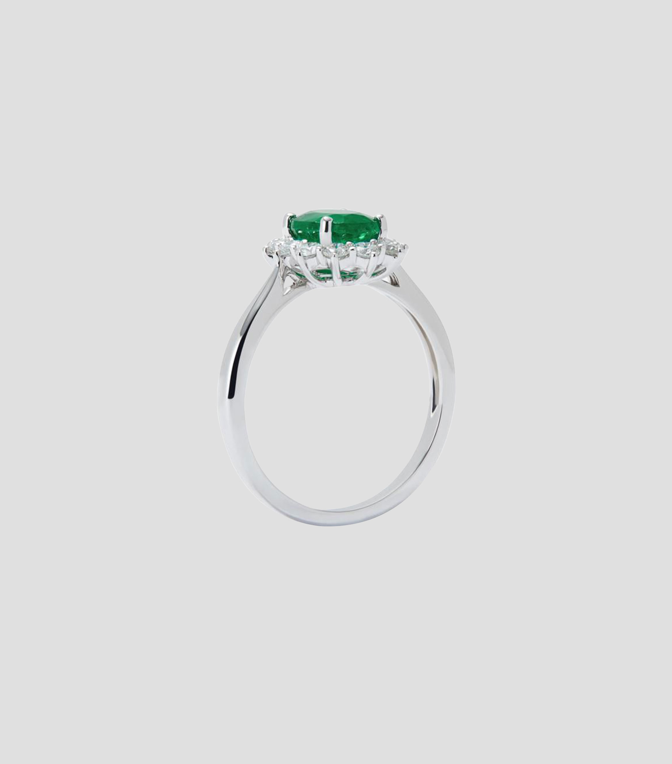 Anillo en Oro blanco de 18 Kilates con esmeralda y diamante Mujer