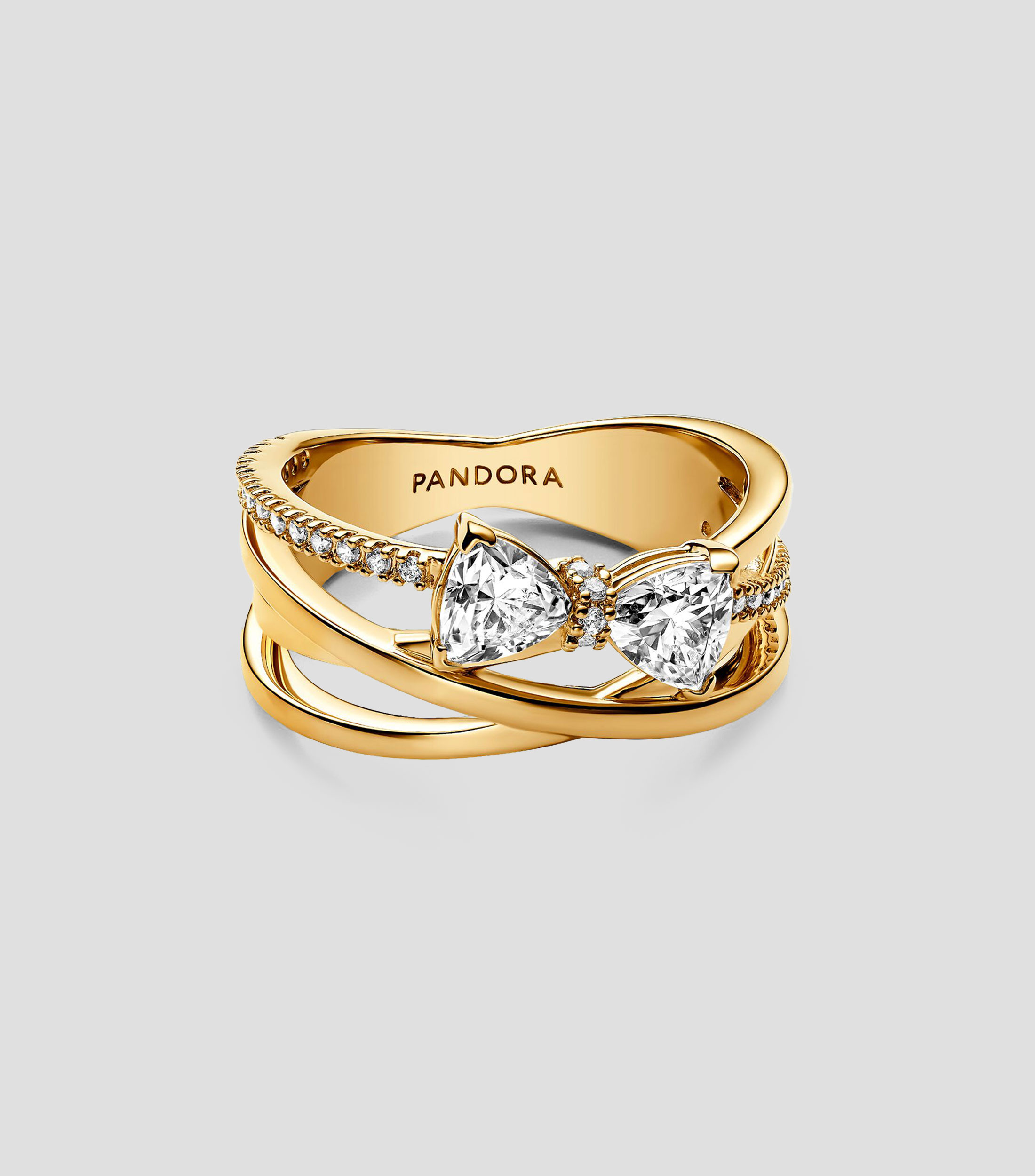 Anillo con zirconias y moño Mujer