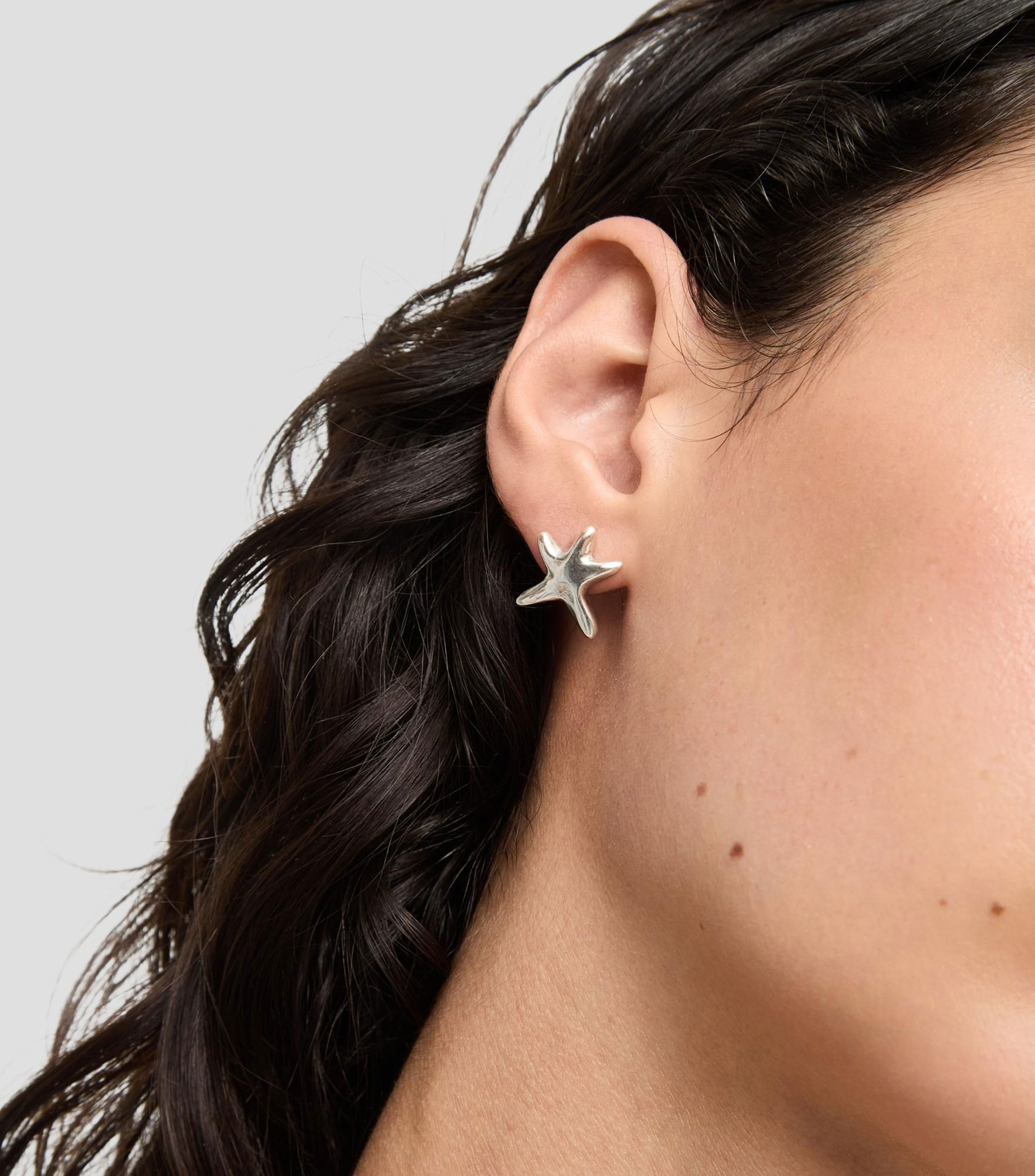 Aretes estrella Mujer