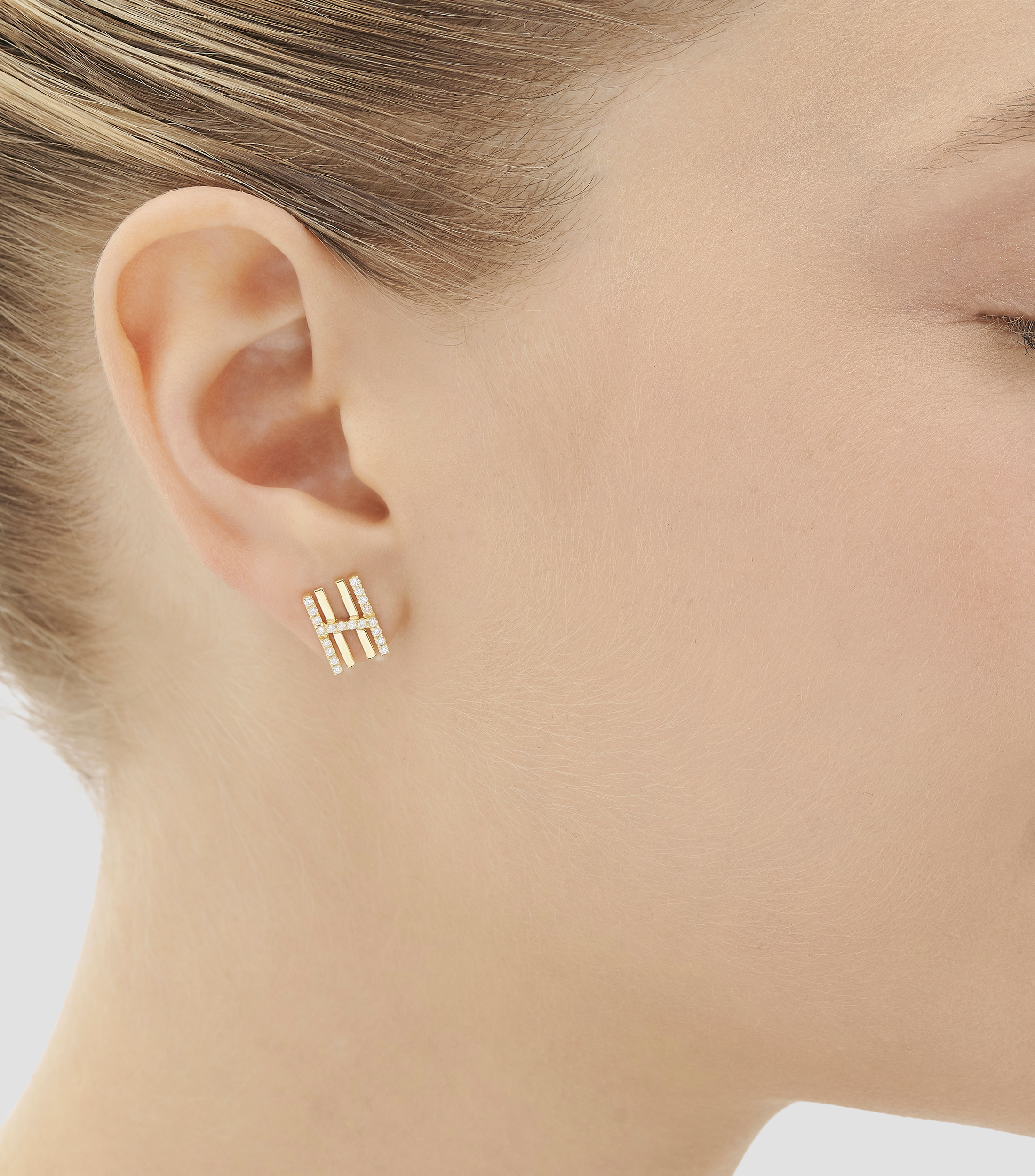Arete en oro amarillo de 18 kilates con diamantes Mujer