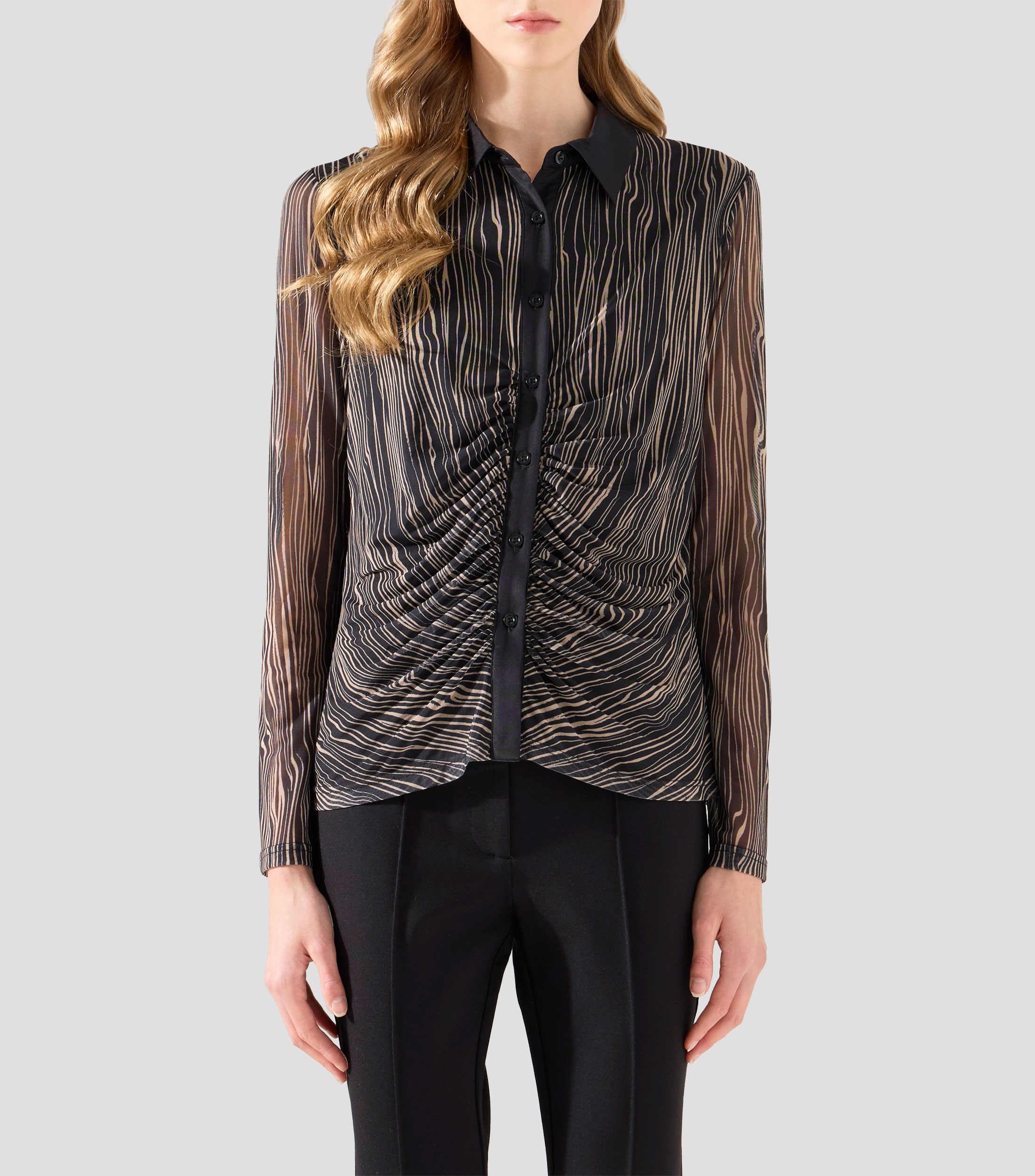 Blusa animalprint con manga larga Mujer