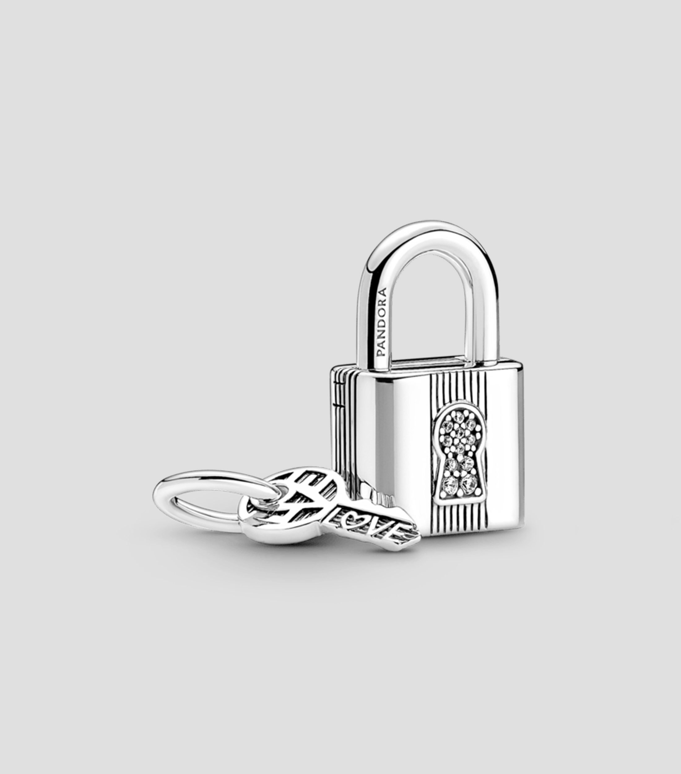 Charm en plata candado y llave con zirconia cúbica Mujer