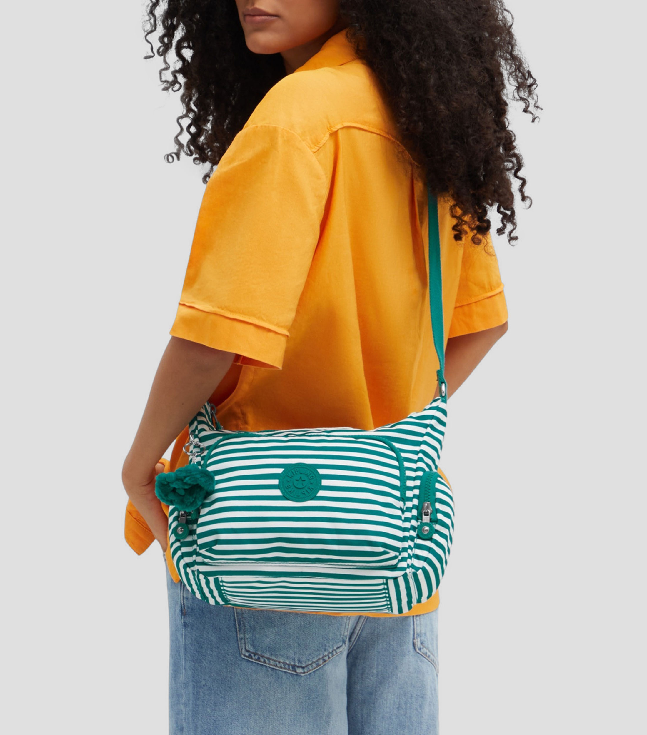 Bolsa crossbody verde Gabb's con rayas Niña