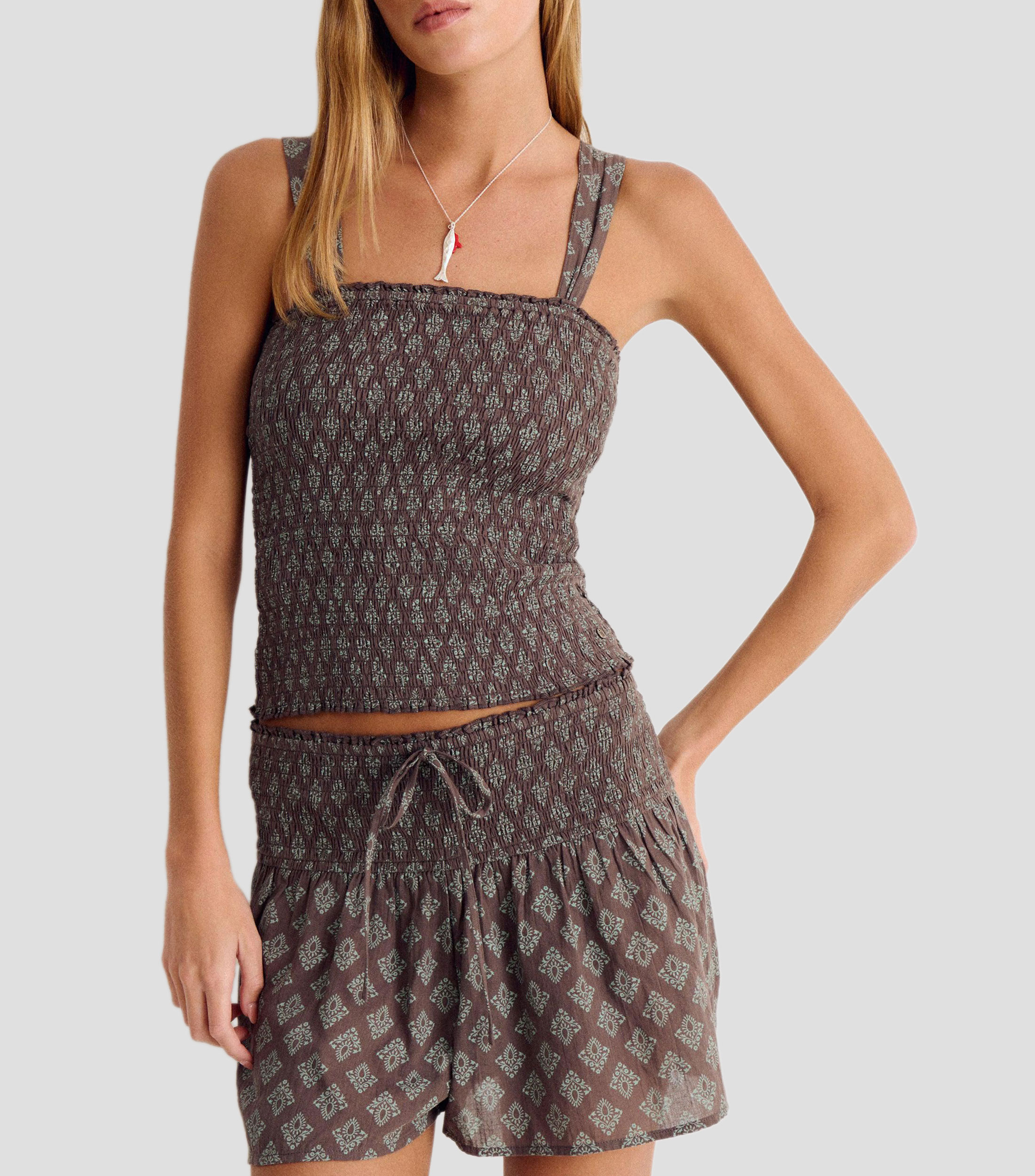 Blusa estampada sin mangas Mujer