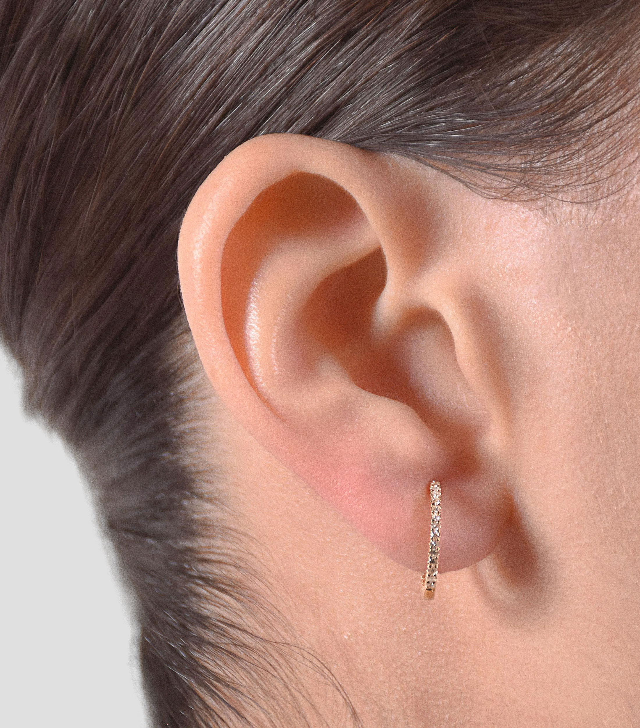 Aretes en Oro amarillo de 18 Kilates con Diamante Mujer