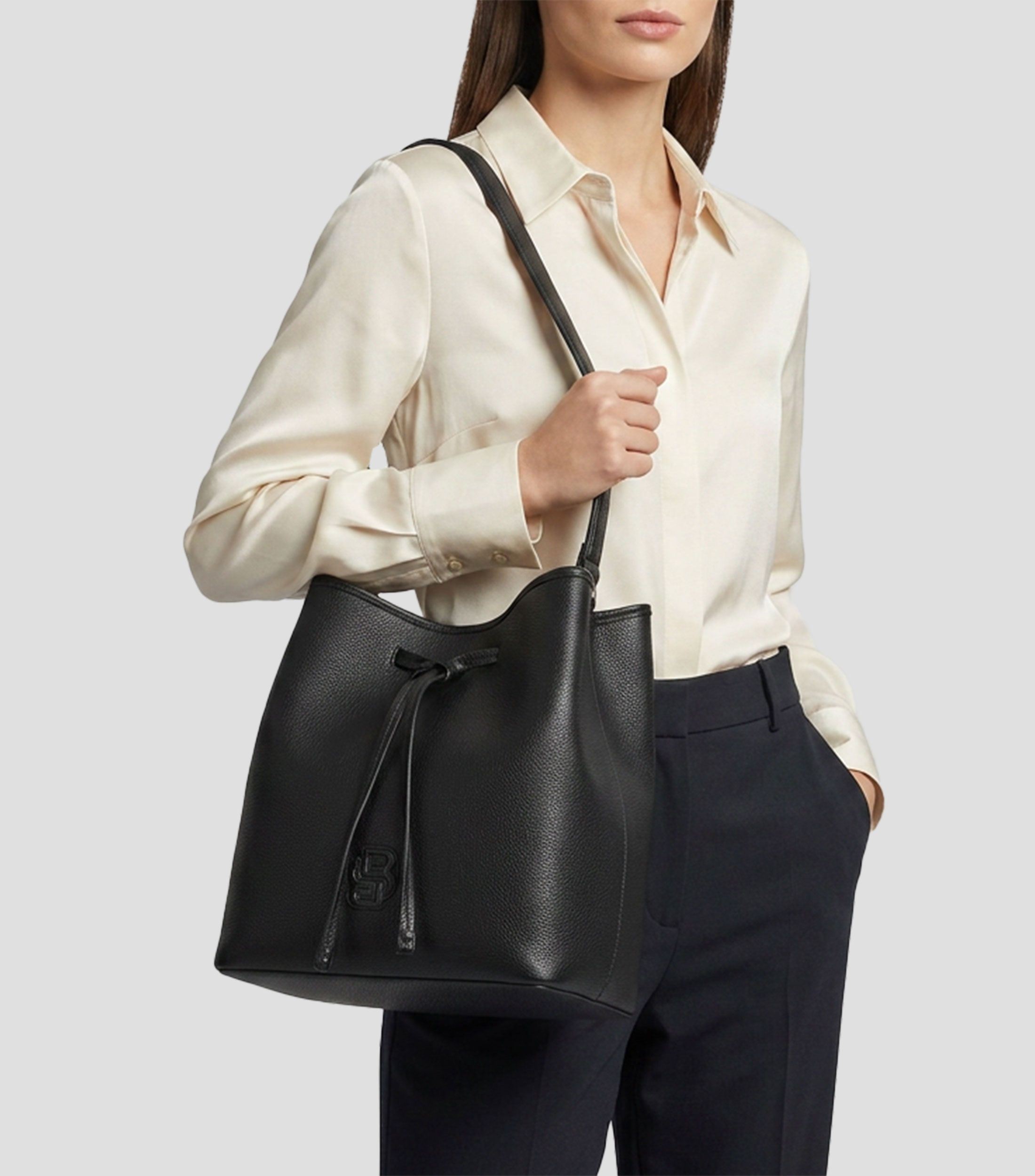 Bolsa hobo lisa con detalle texturizado Mujer