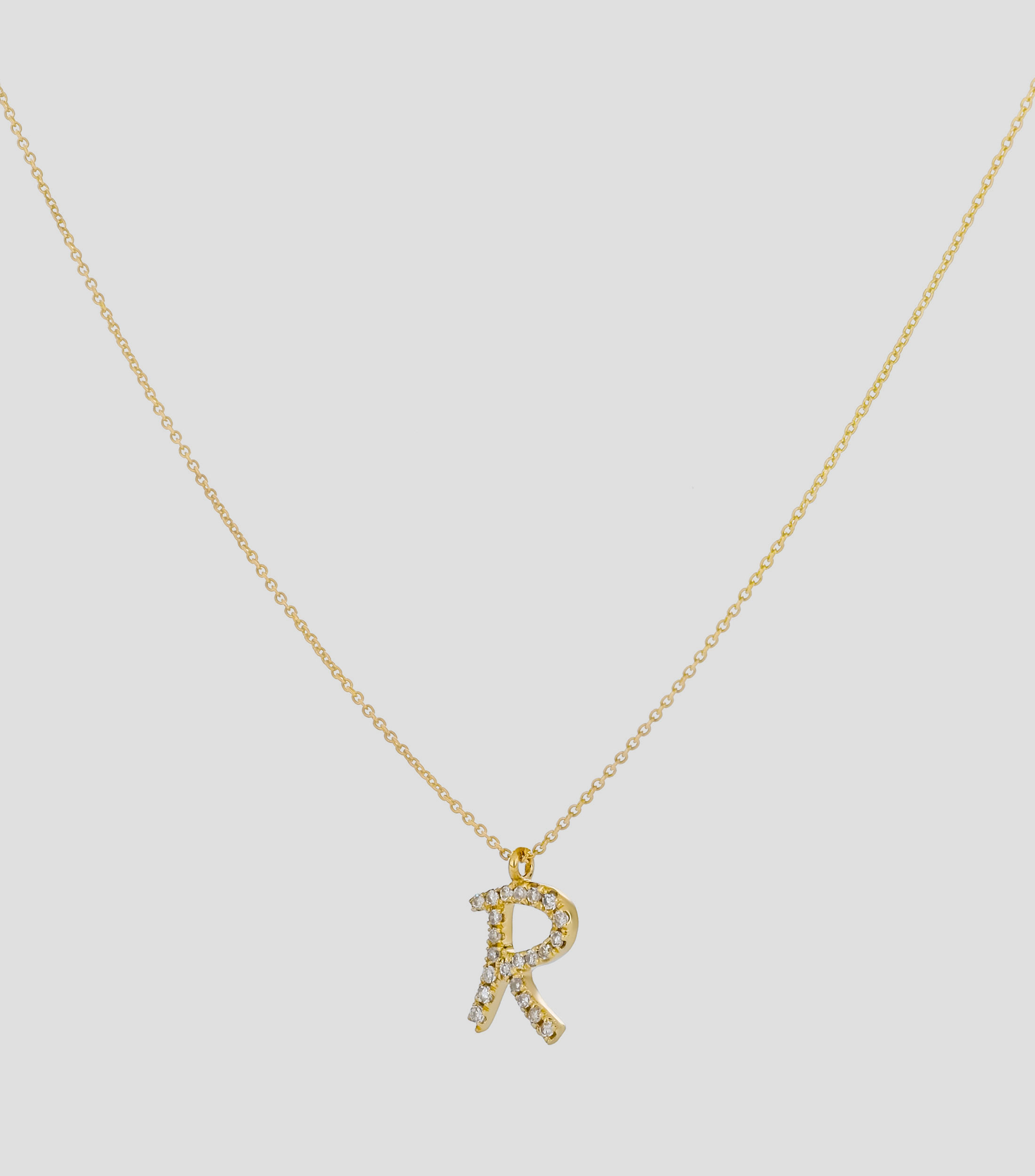 Dije y cadena en oro amarillo 14 Kts Mujer