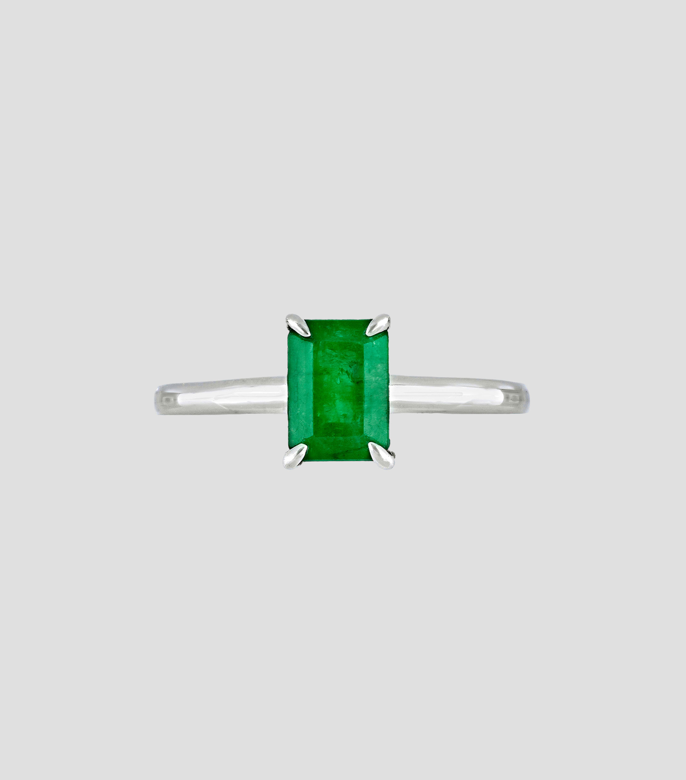 Anillo de compromiso en oro blanco 18 Kts con esmeralda Mujer