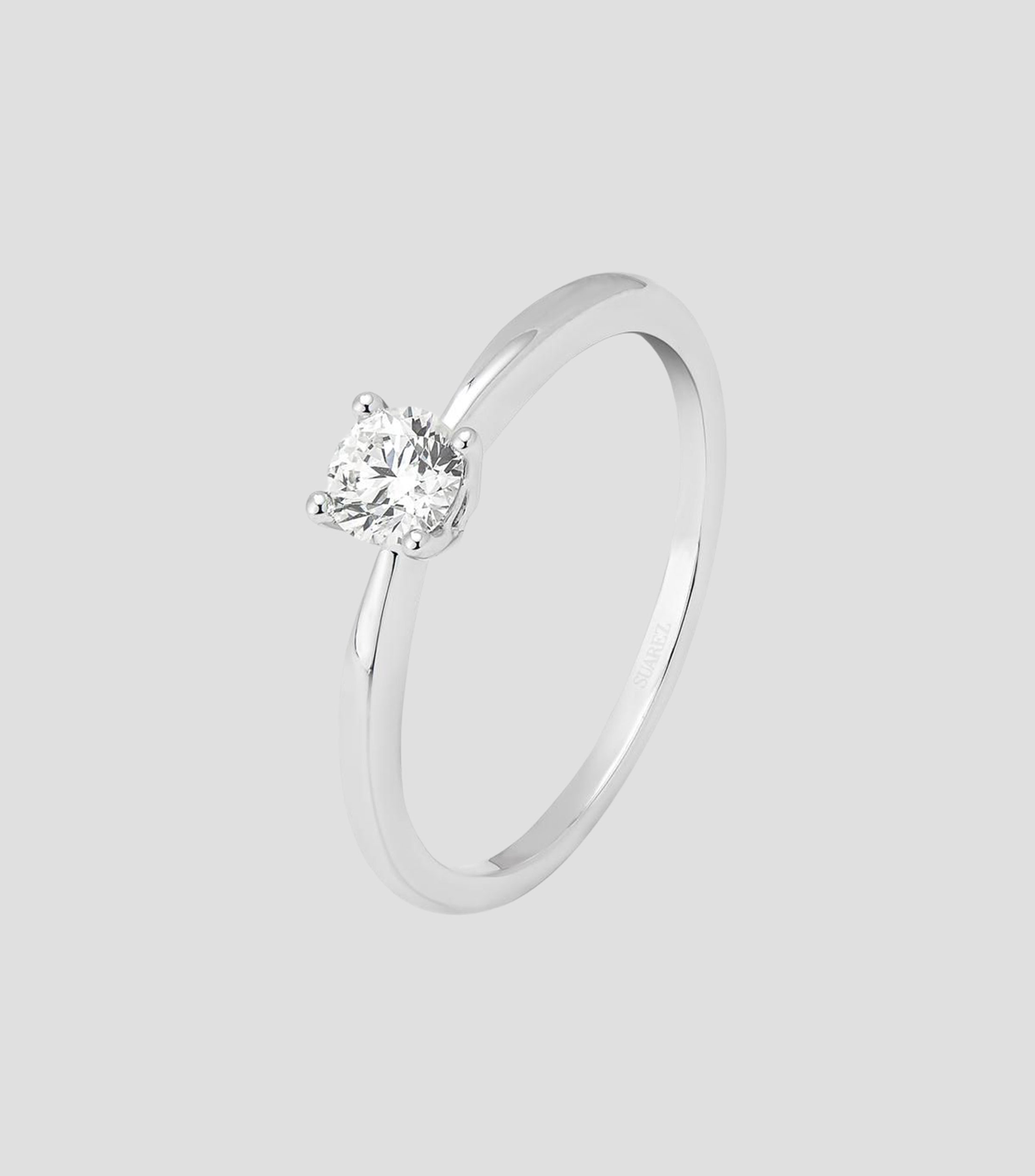 Anillo solitario en Oro blanco de 18 Kilates con diamante Mujer