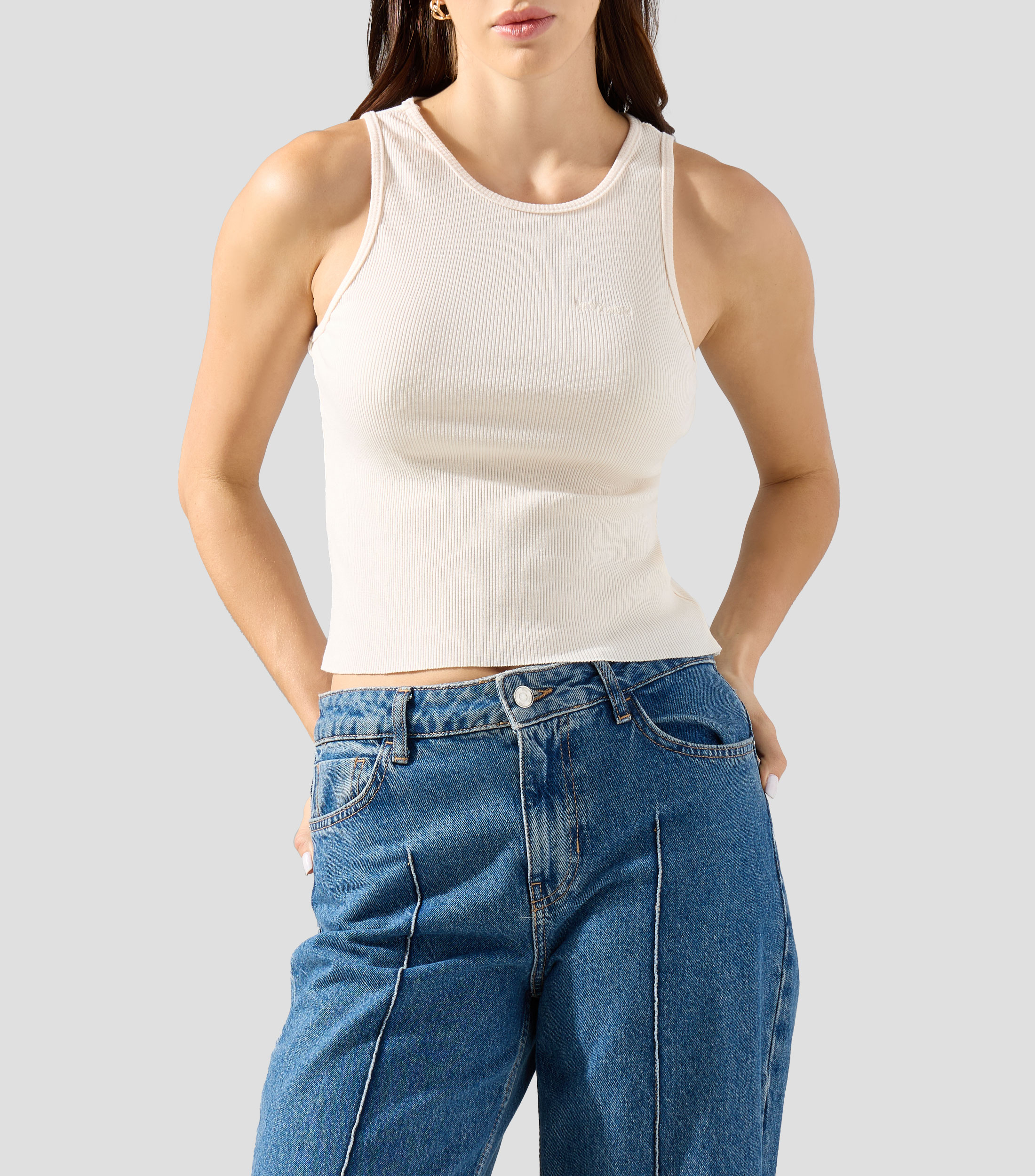 Playera cuello redondo sin mangas lisa Mujer