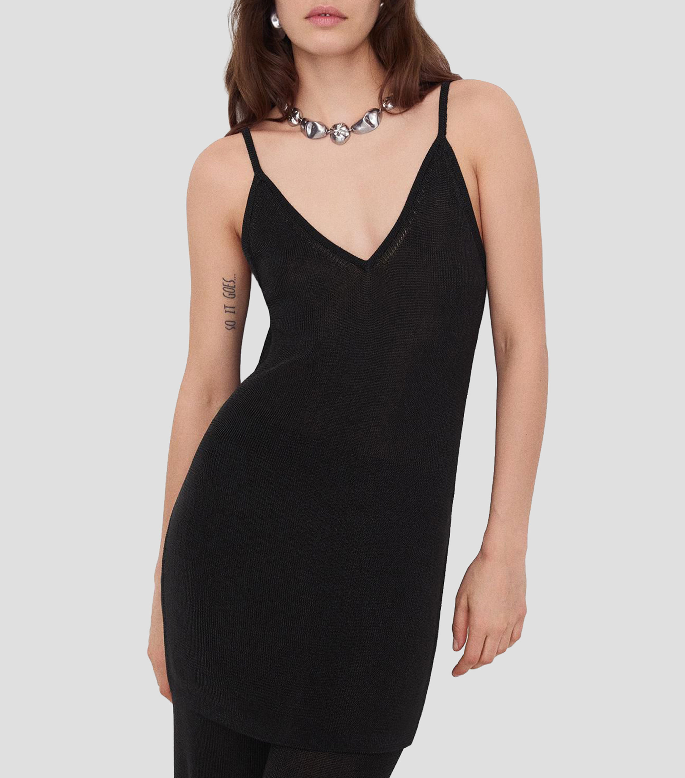 Top cuello V sin mangas liso Mujer