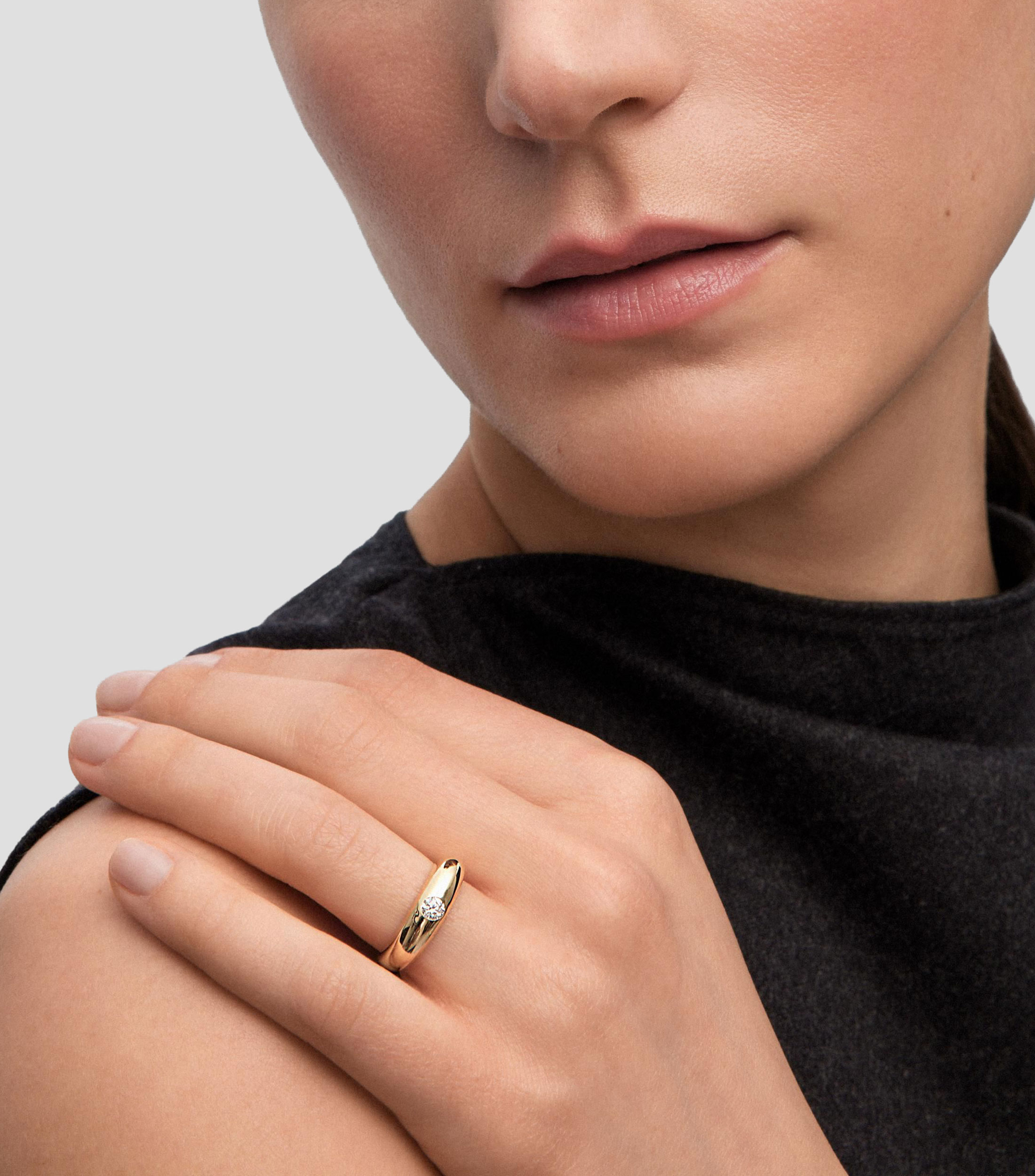 Anillo en oro amarillo 18 Kilates con diamante Mujer