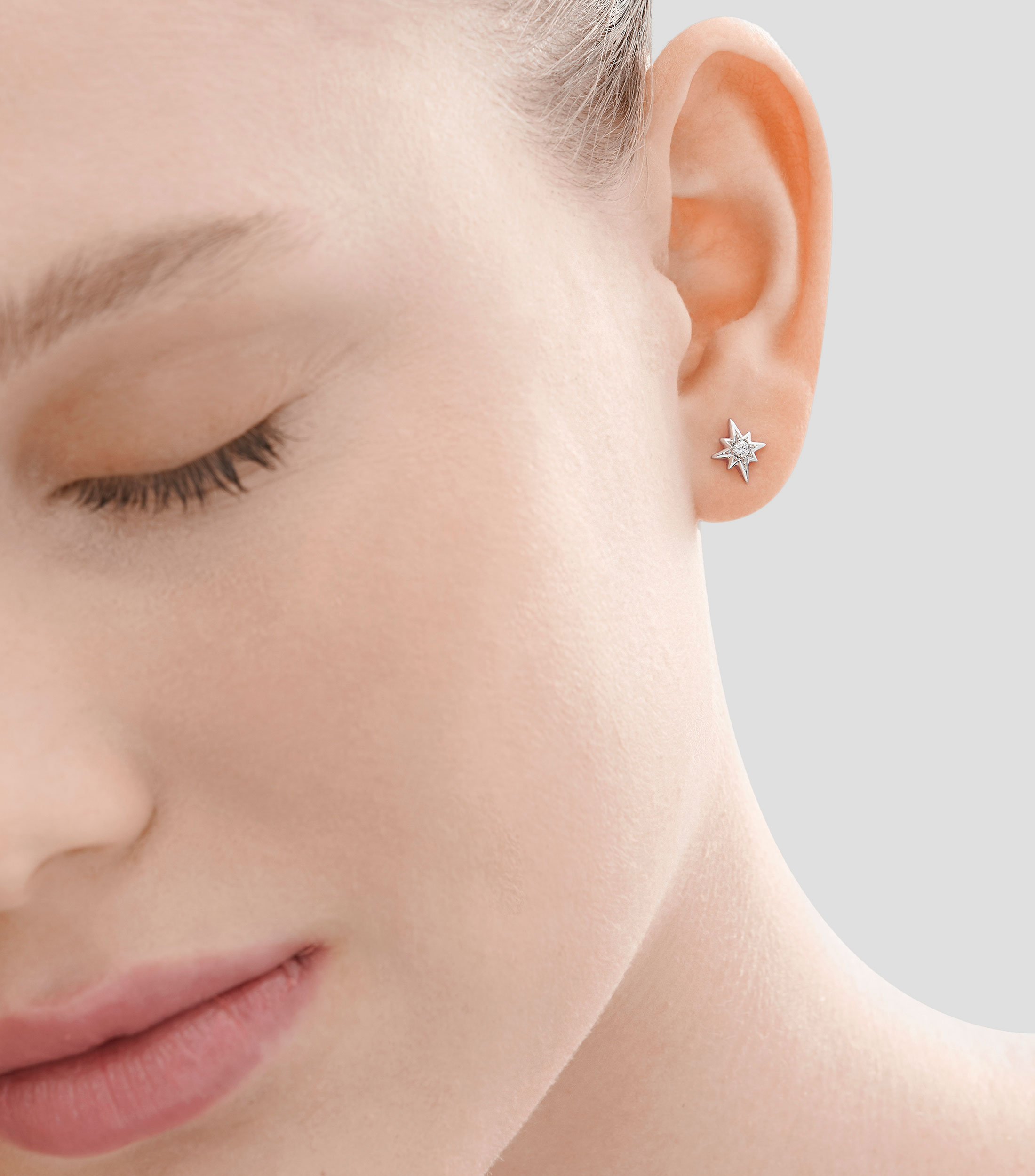 Aretes en oro blanco de 18 kilates con forma de estrella y diamantes MyCollection Caress Mujer