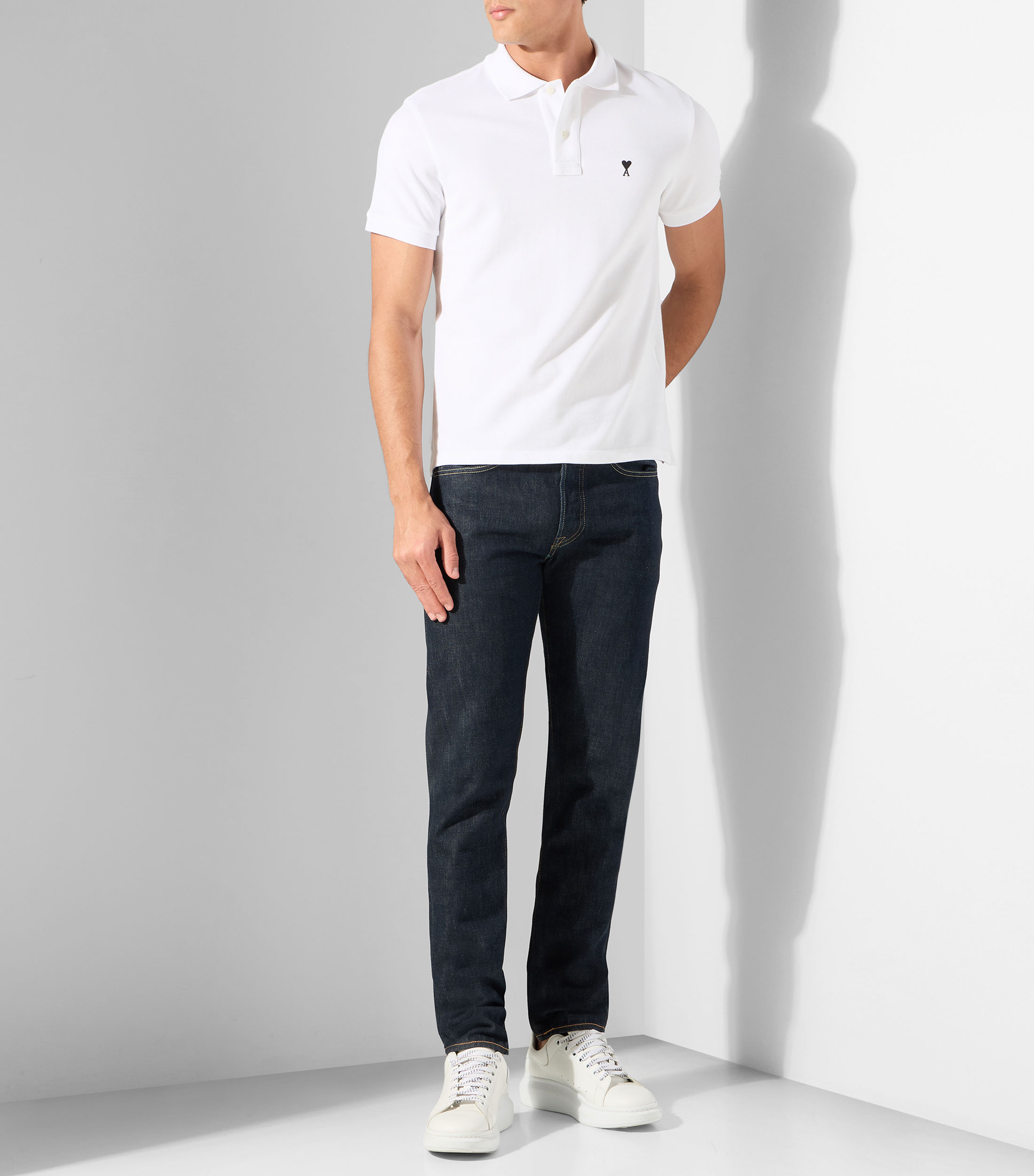 Playera tipo polo con manga corta lisa Hombre