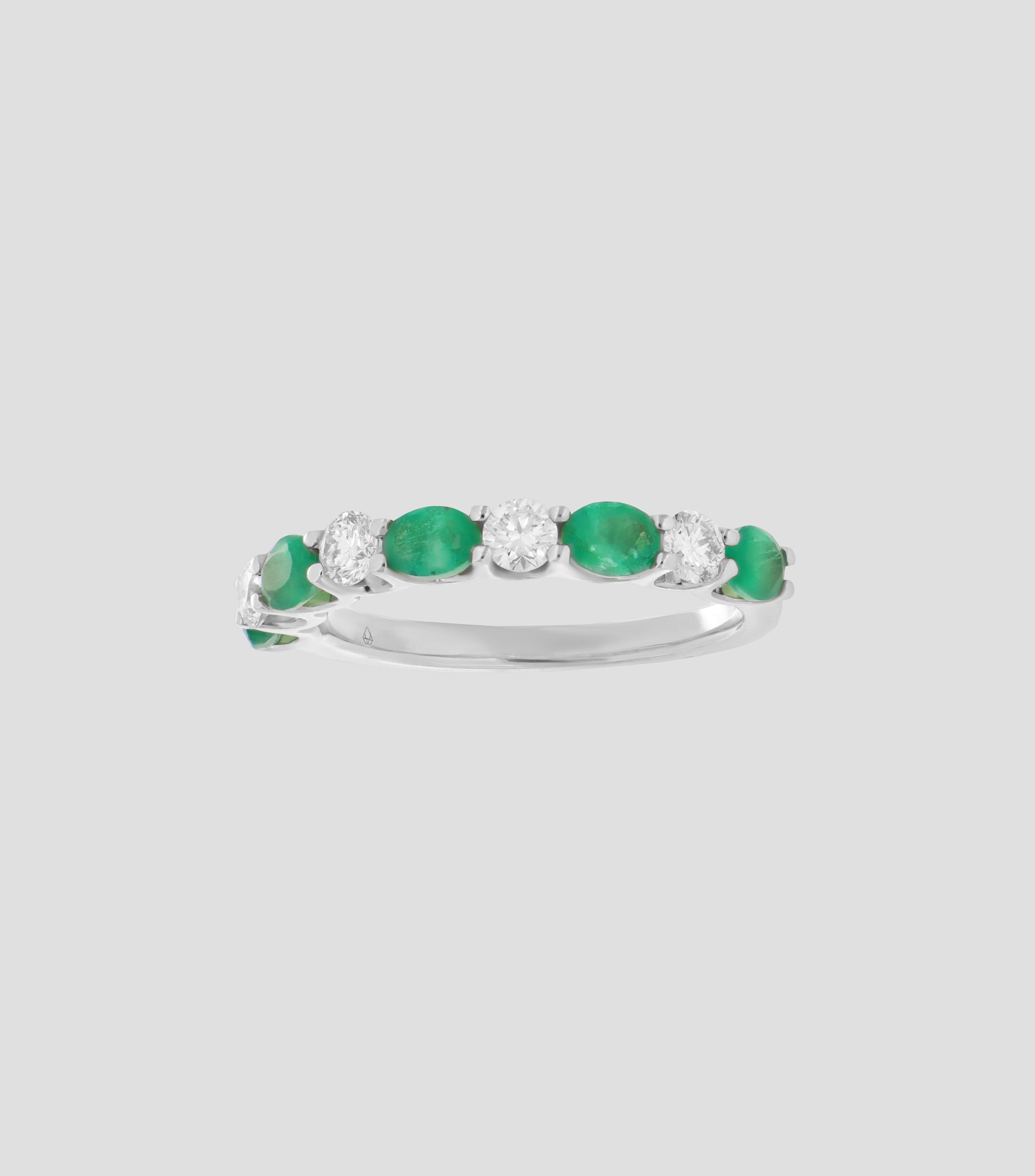 Anillo en oro blanco de 14 kilates con esmeraldas Mujer