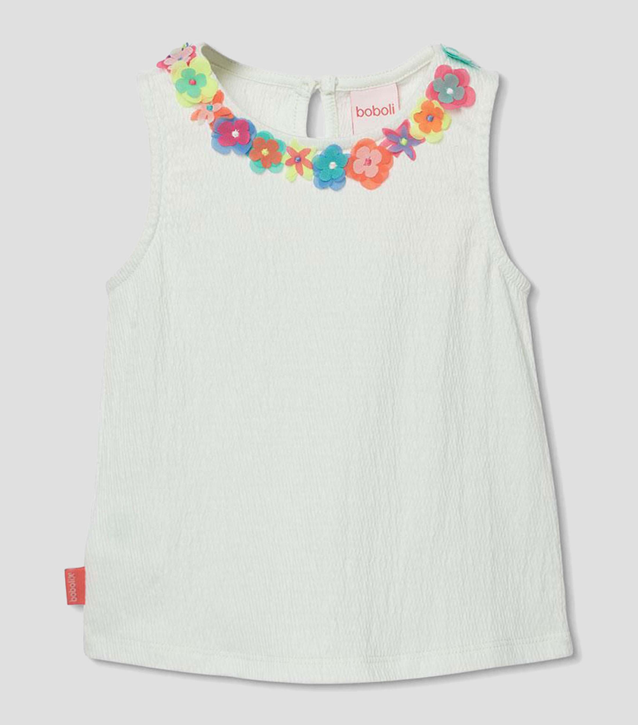 Playera cuello redondo sin mangas lisa Bebé