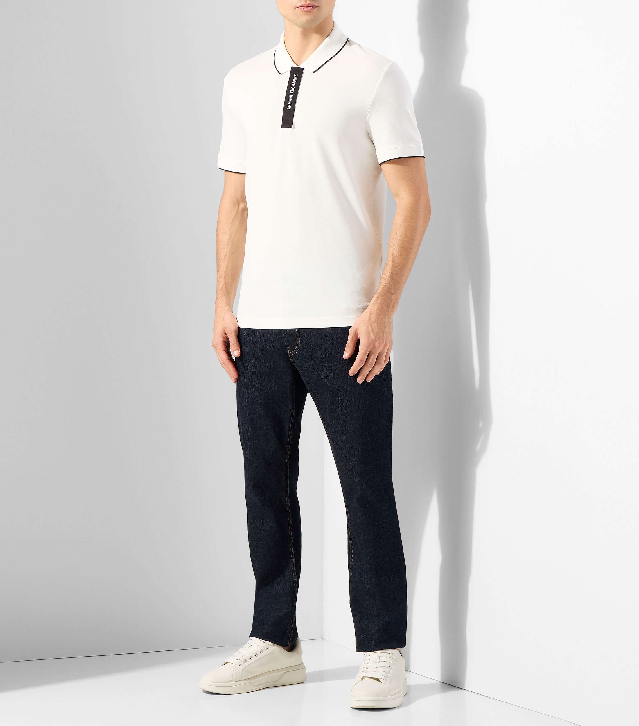 Playera tipo polo con manga corta lisa Hombre