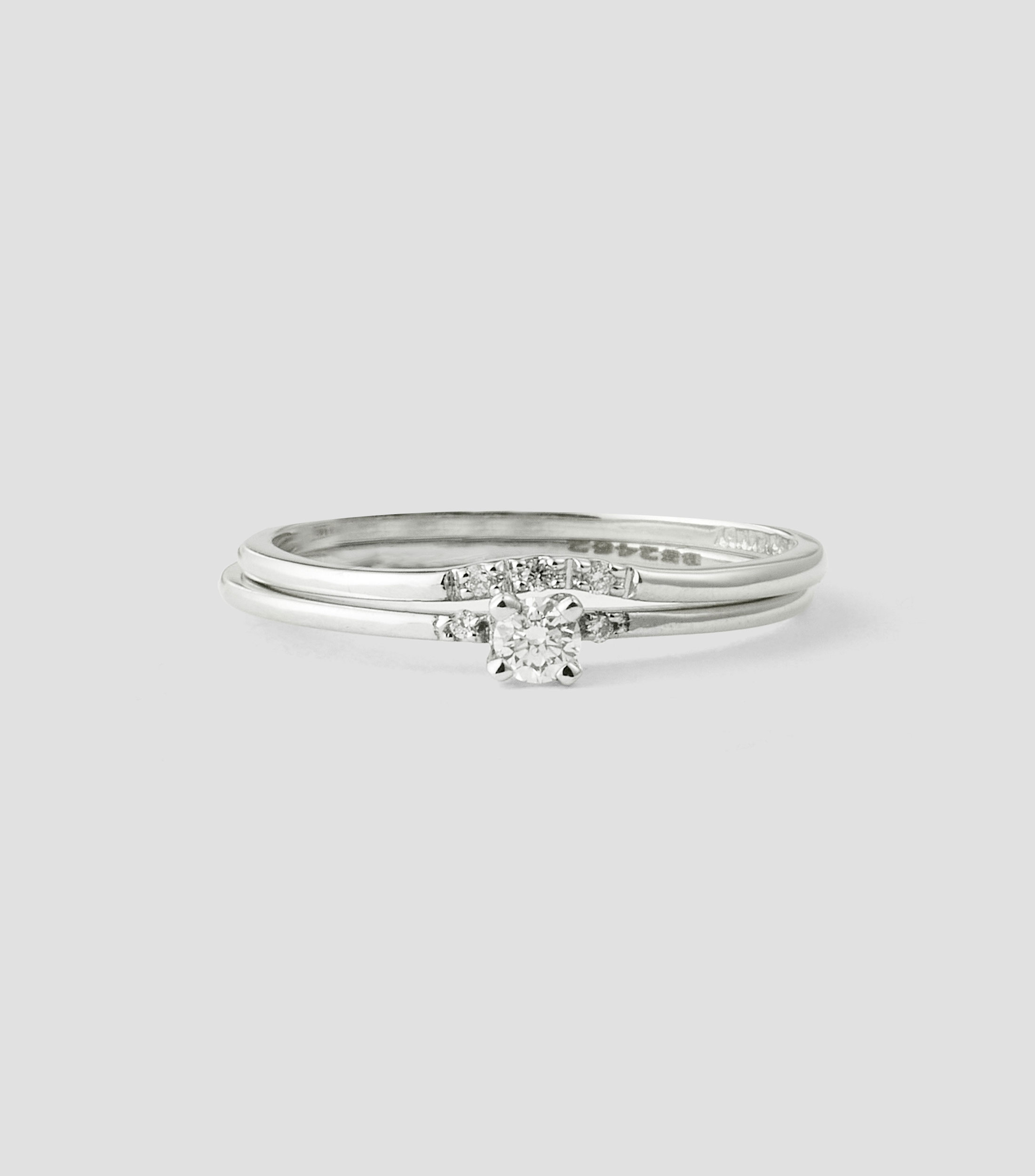 Anillo solitario doble en oro blanco de 14 kilates con diamante Mujer