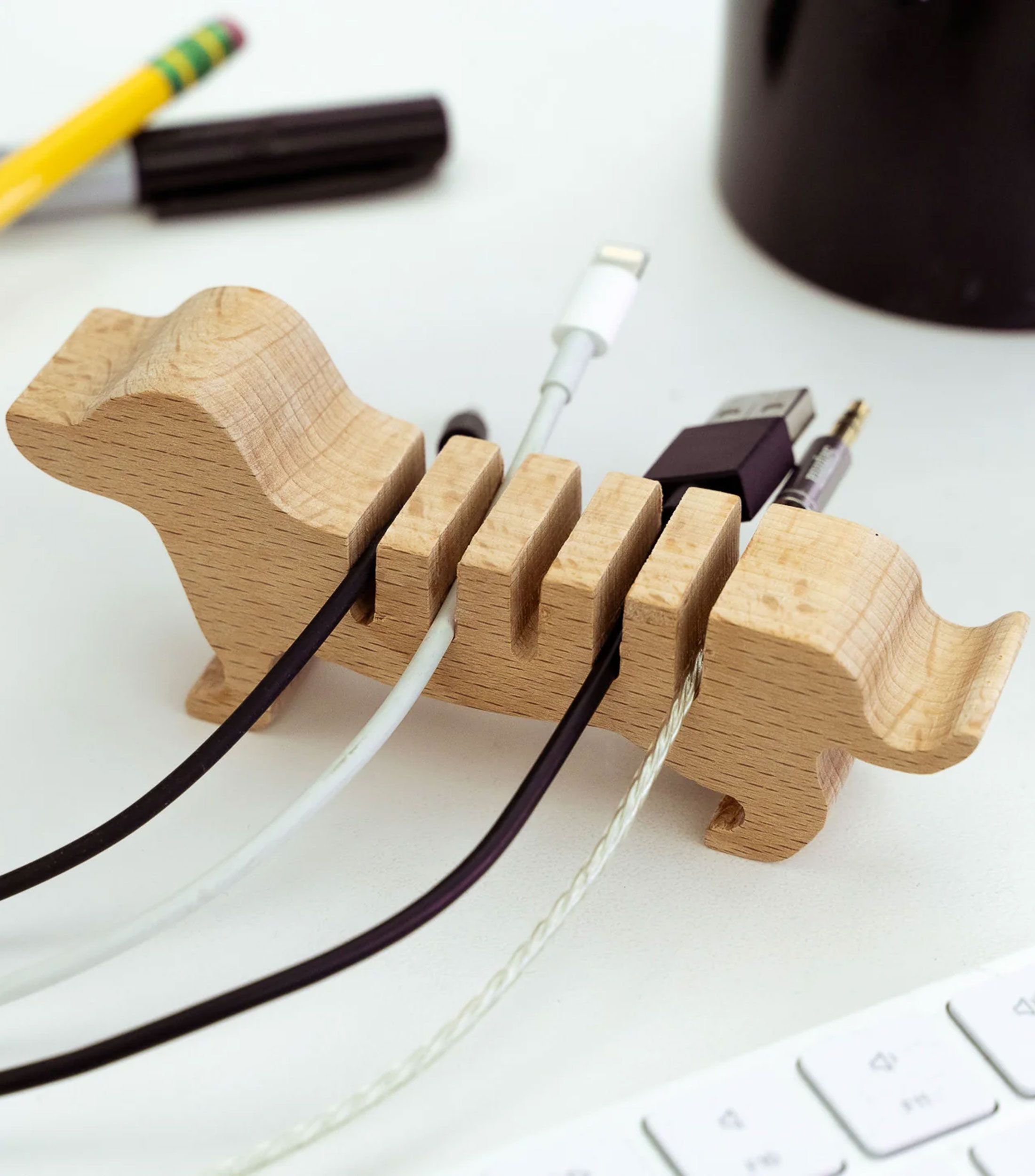 Soporte para cables en forma de perro