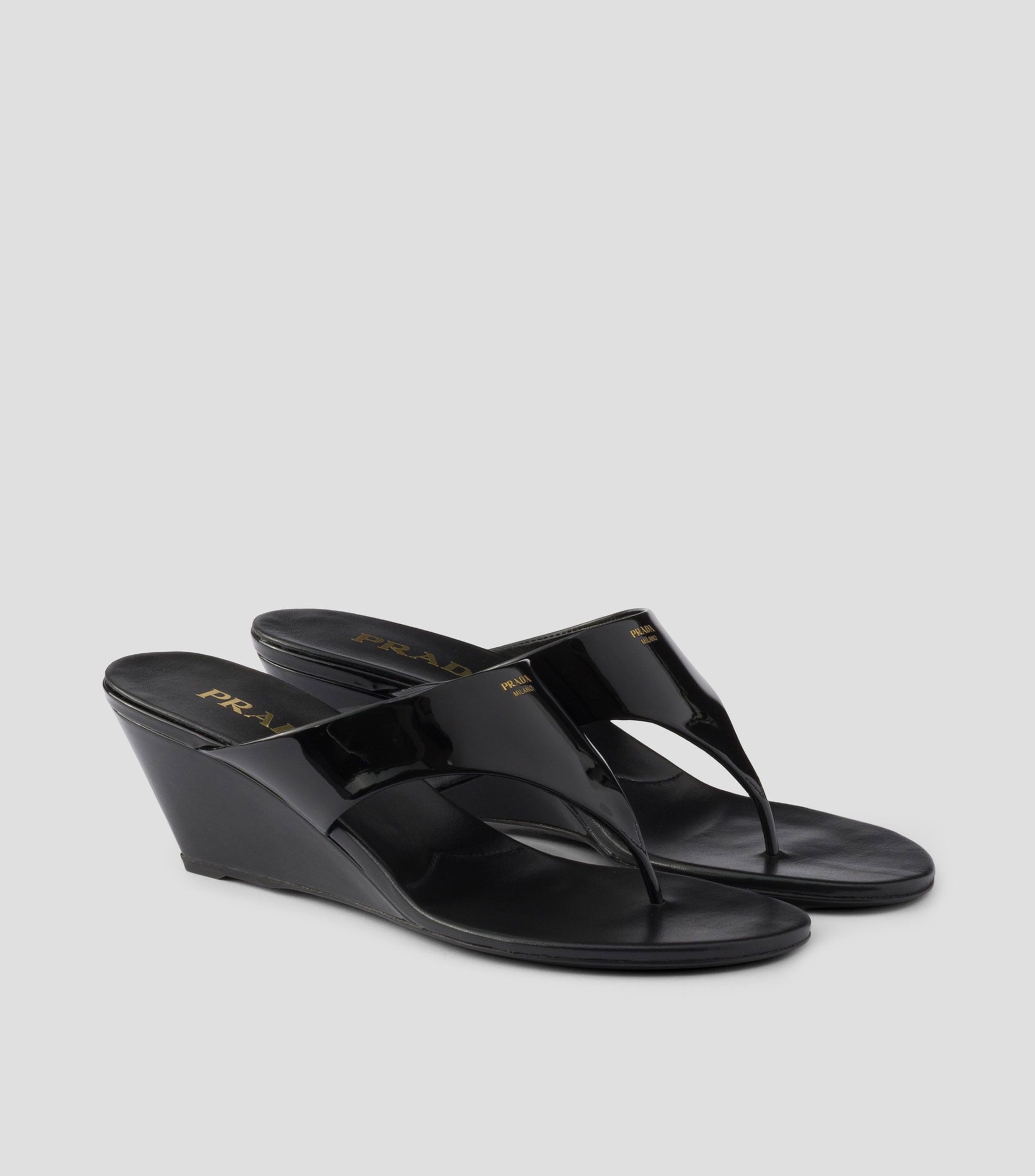 Sandalias en piel de tacón bajo de cuña Mujer
