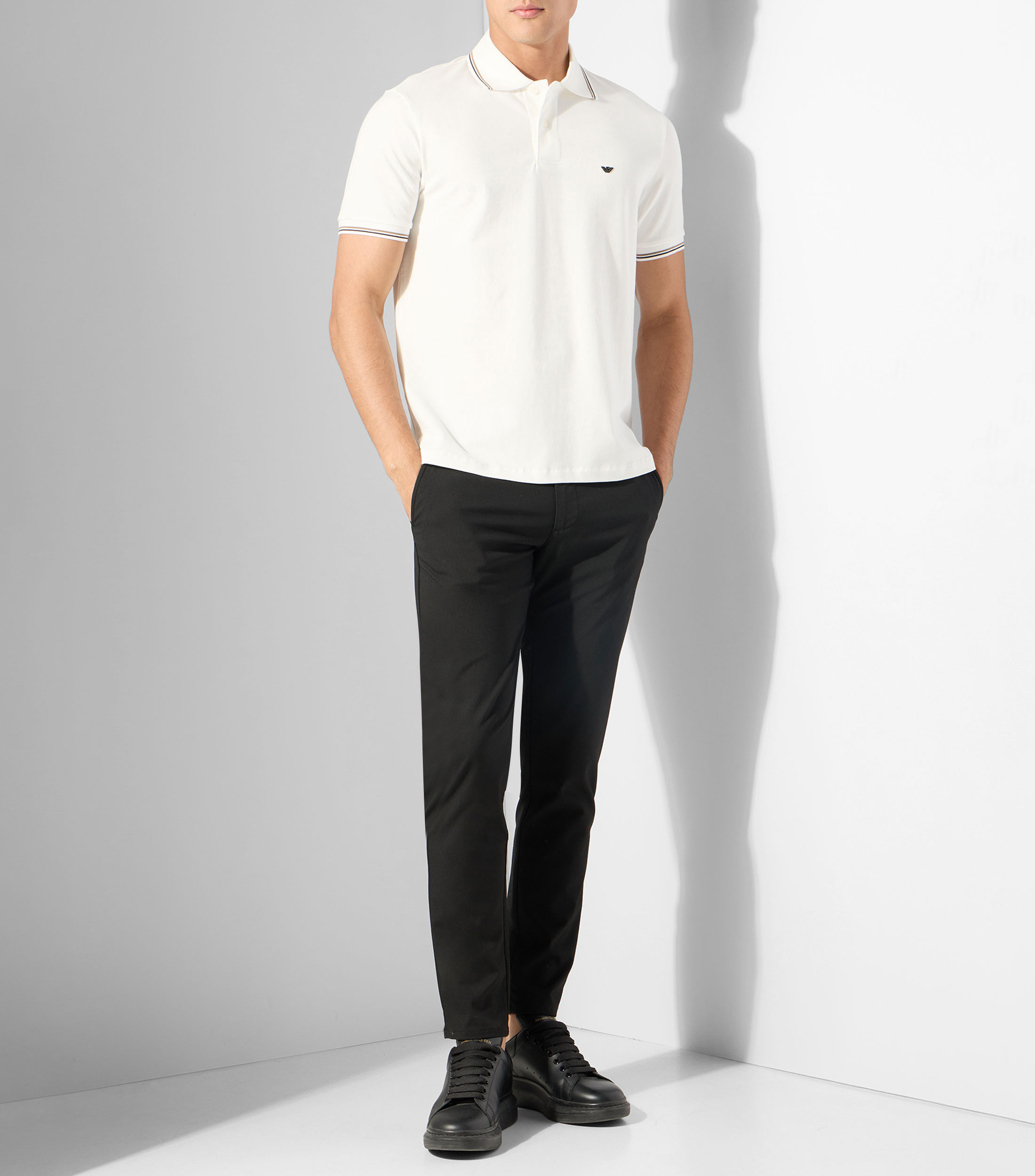 Playera tipo polo con manga corta lisa Hombre
