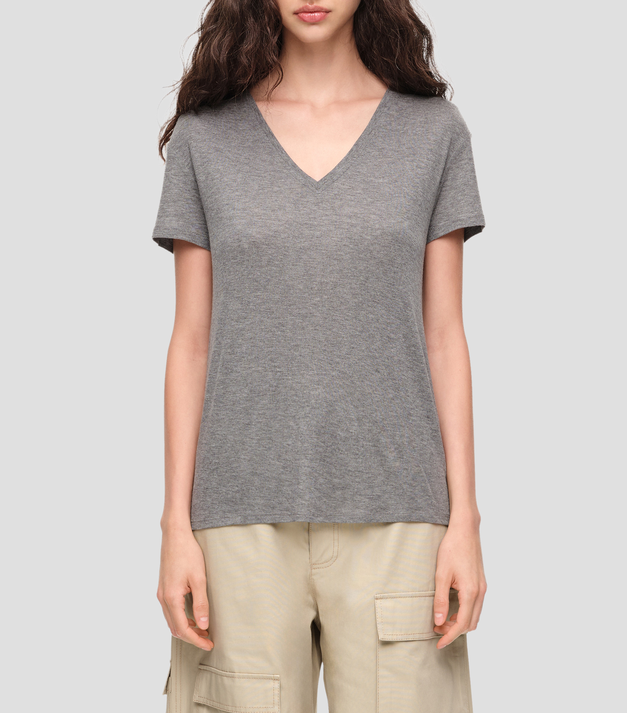 Playera cuello V manga corta jaspeada Mujer