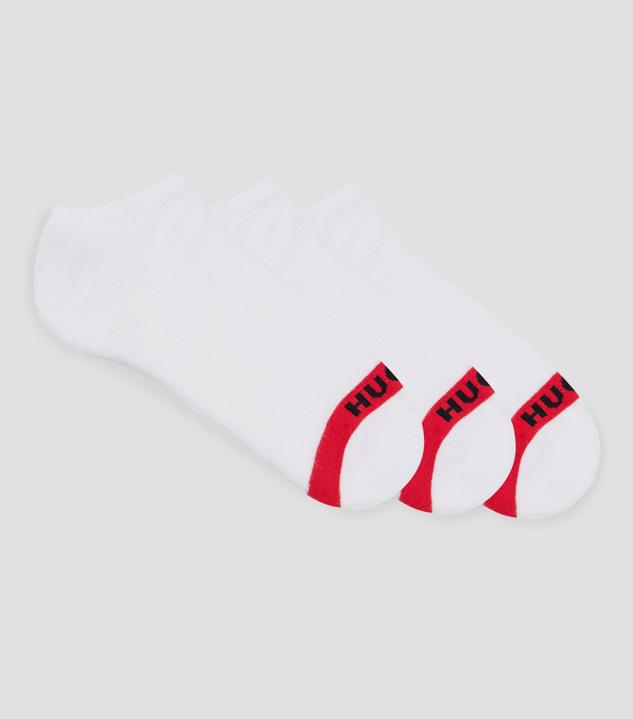Paquete de tres pares de calcetines invisibles con detalles de logos Hombre